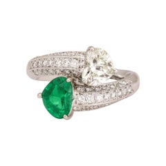 1980's Rare Heart Shaped Emerald and Diamond Platinum Crossover Ring