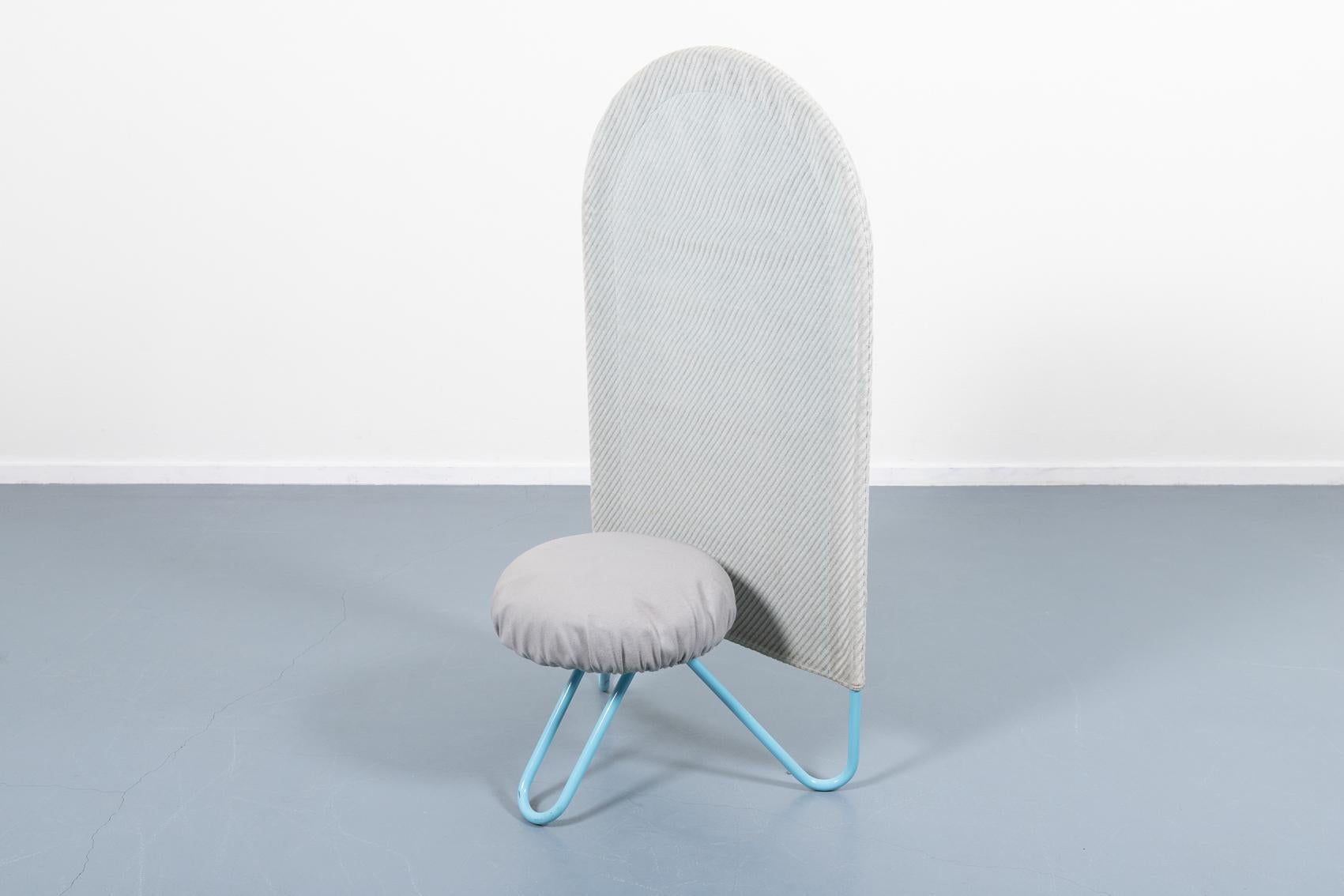 Very rare high back chair produced by Bonaldo in 1980’s. It features light blue coated tubular steel frame with removable fabric cover dressed on the backrest. It also has a removable grey fabric seat cover.

Condition
Good, age related wear and