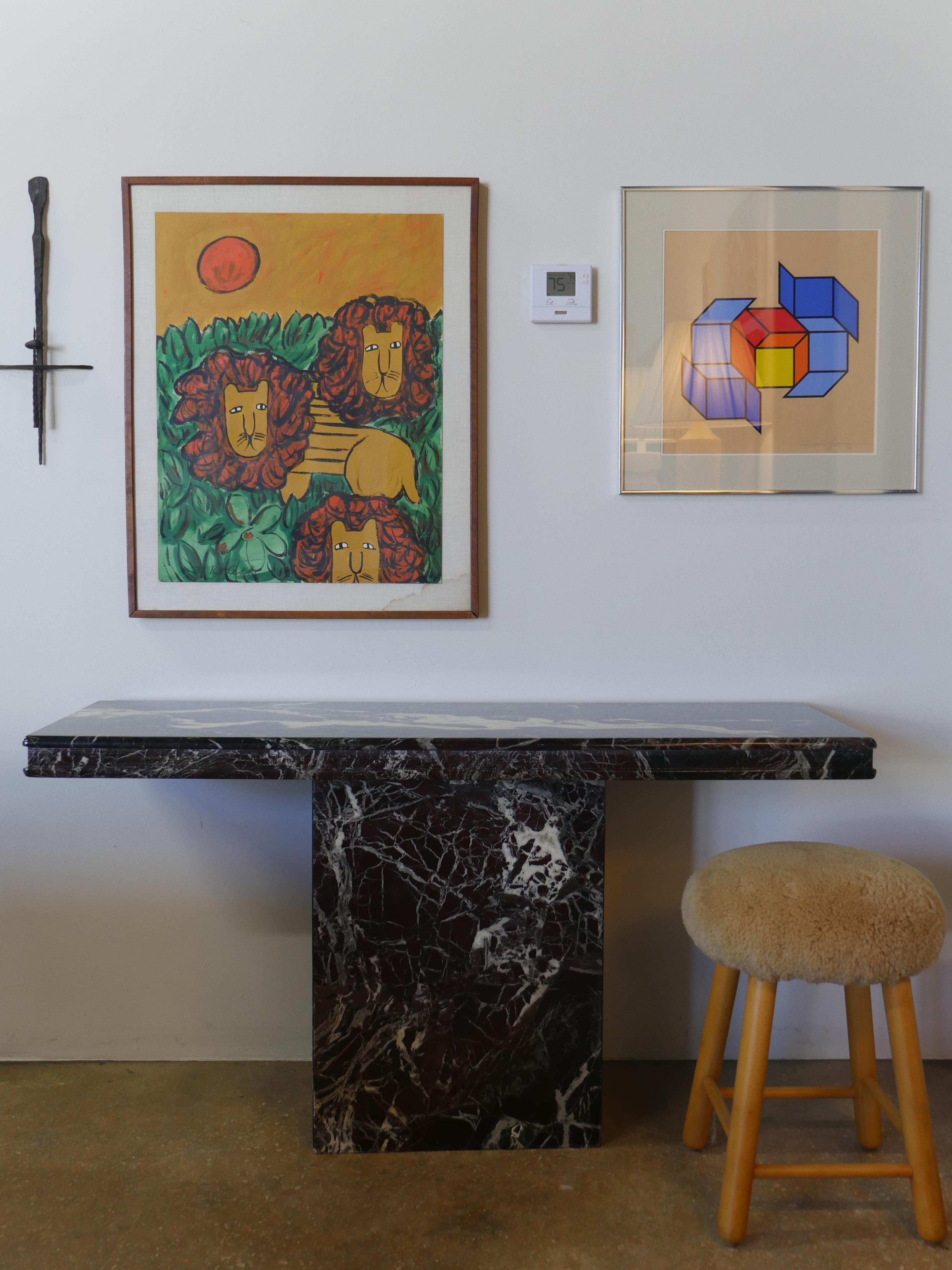 Striking 1980s Red Levanto Italian marble console table. A gorgeous, highly variegated marble console table featuring veining in a red maroon, dark green and white with a polished finish. It has a clear protective resin coat that has allowed this