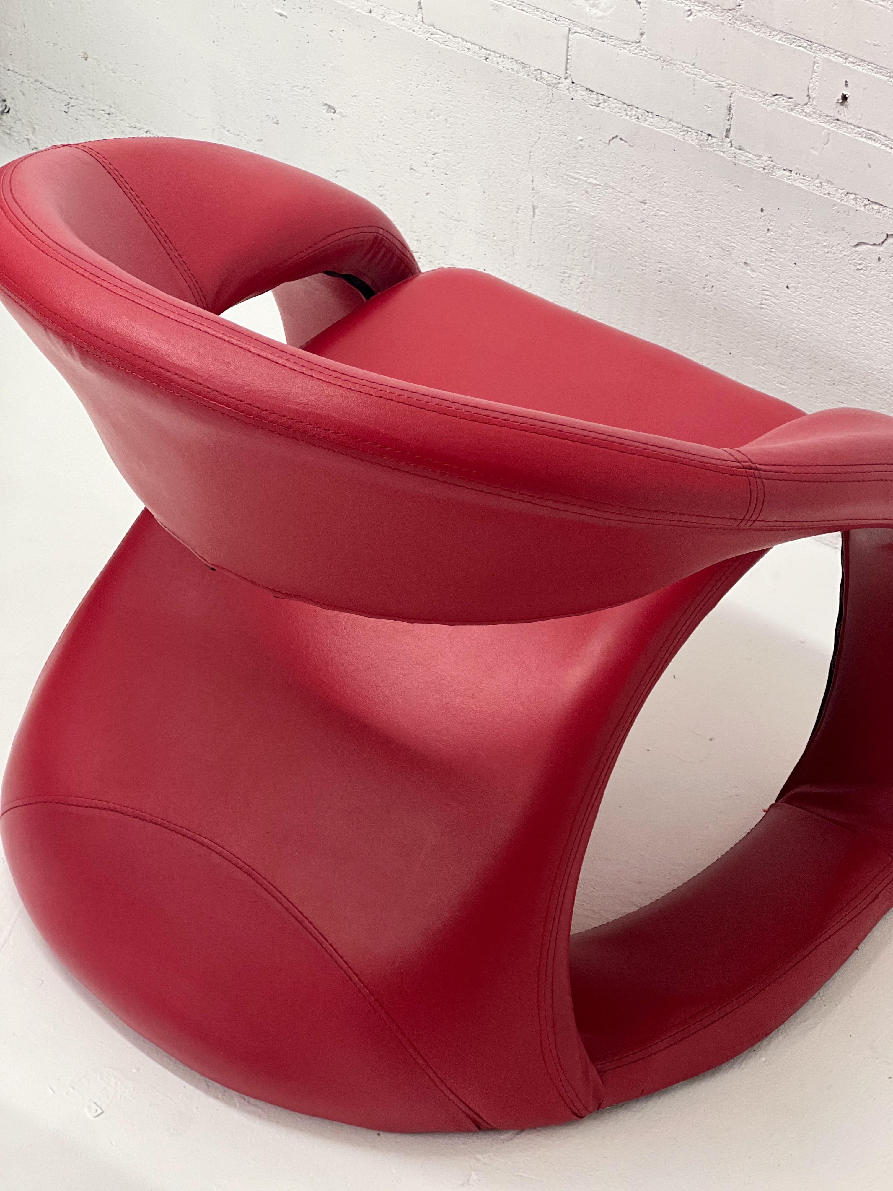 Vintage 1980's bright red pop art tongue chair attributed to Jaymar. The sculptural pop of red with all the right curves to complete your primary color set. There's not a bad angle on it. Extremely comfortable, it passes the 