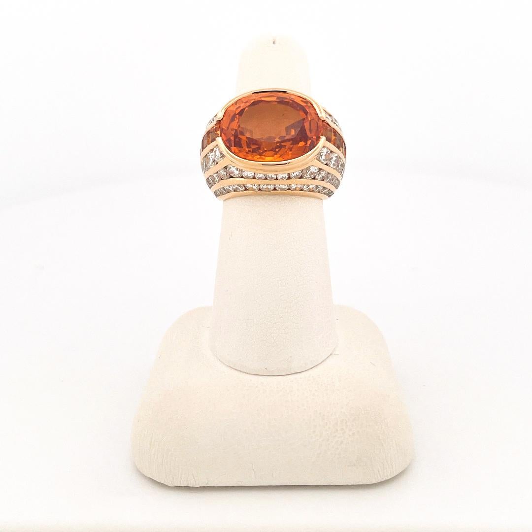 From the designer Repossi, this 1980’s 18 karat yellow gold diamond ring featuring an oval yellow sapphire weighing approximately 14.80 carats. The ring is also channel set with 10 square yellow sapphires and 2 tapered baguette yellow sapphires with