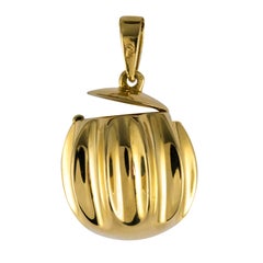 1980s Retro Secret 18 Karat Yellow Gold Pendant