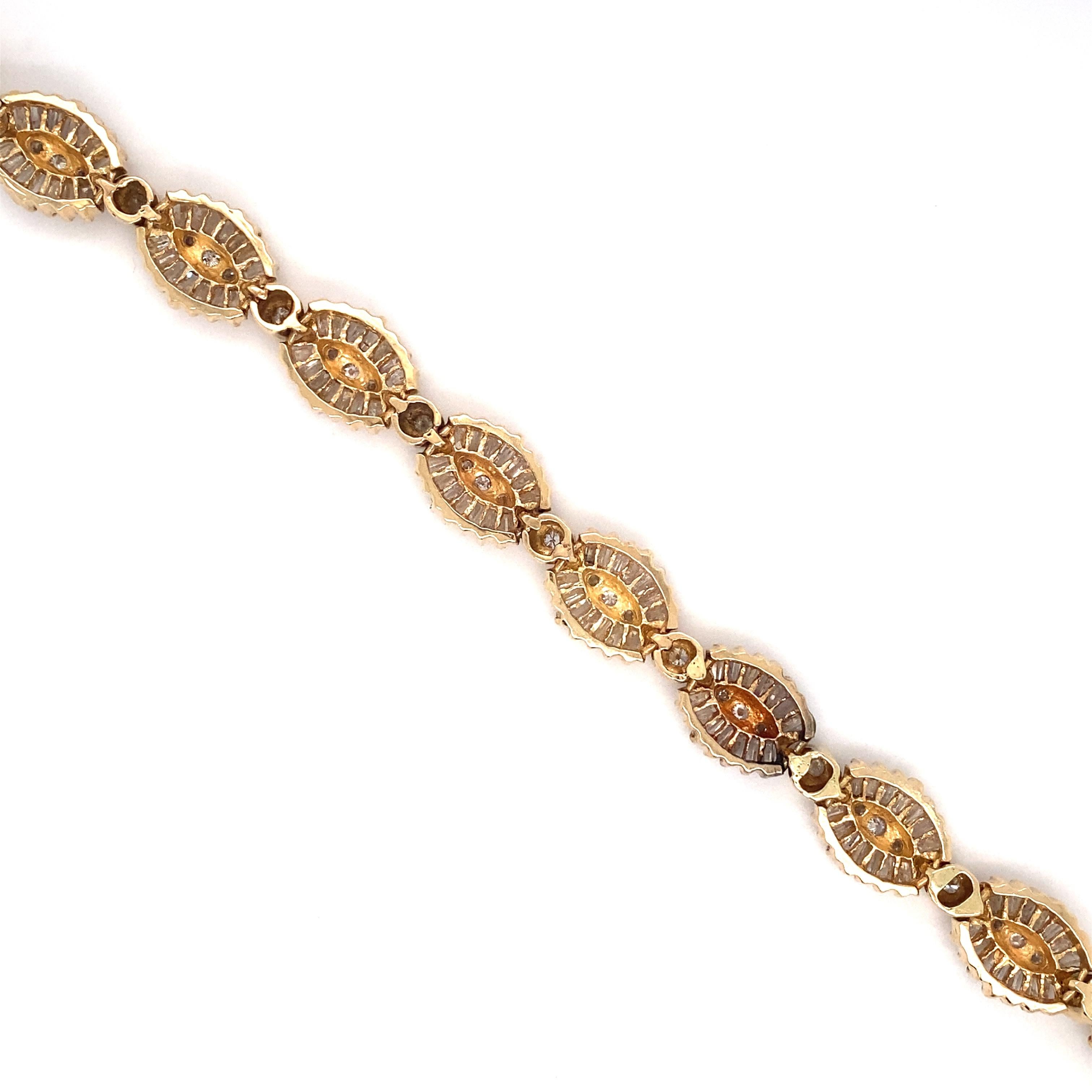 Circa: 1980s
Metal Type: 14 Karat Yellow Gold
Weight: 25.5 grams
Dimensions: 6.75 inch Length

Diamond Details:
Carat: 3.50 Carat Total Weight
Cut: Round and tapered baguette
Color: G-I
Clarity: VS-I1