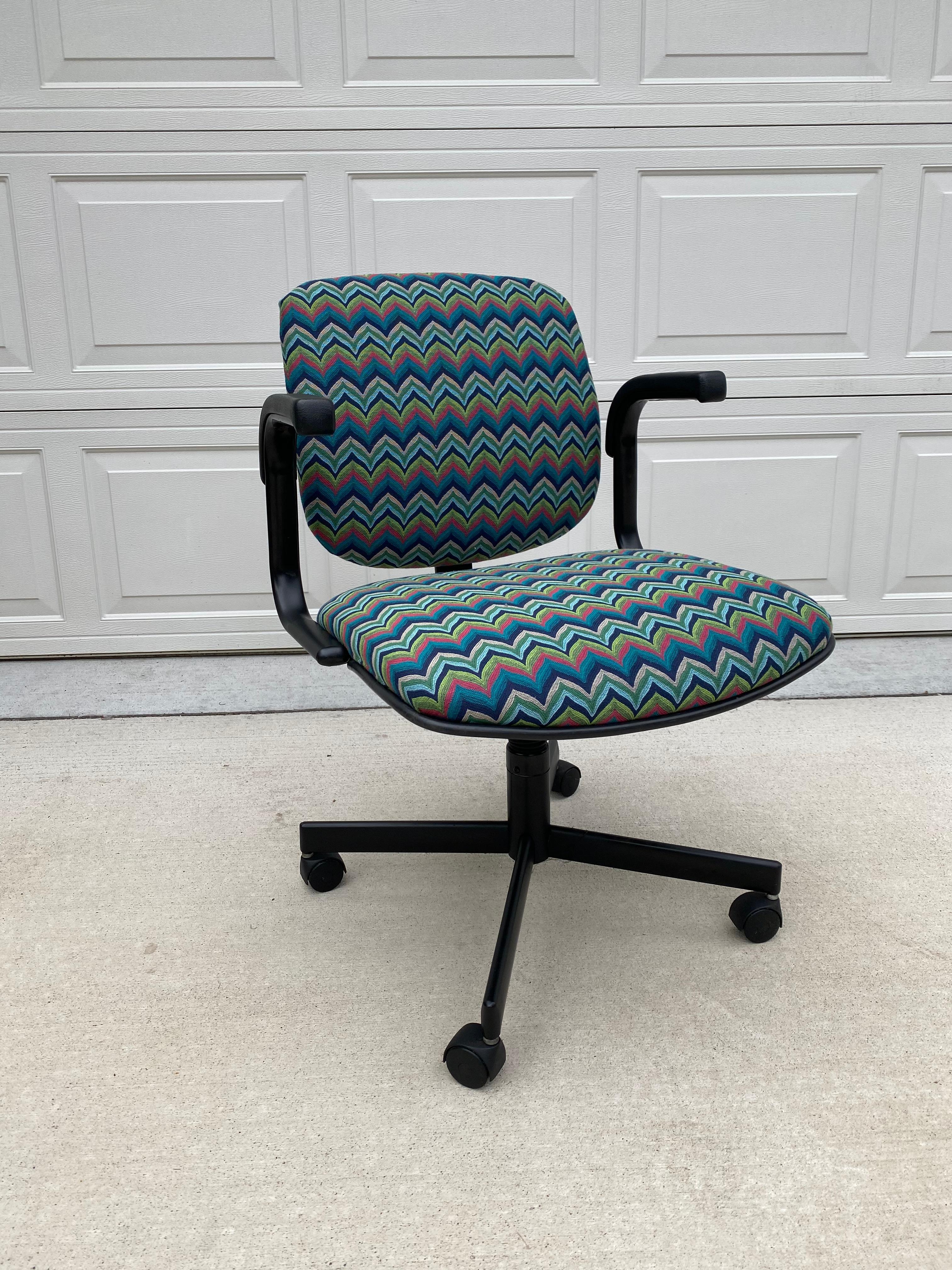 Reupholstered office chair by Stylex, Inc. in a mid-century modern flame stitch woven fabric. This office chair is in amazing condition considering its age. Its a perfect chair to add to your office!.