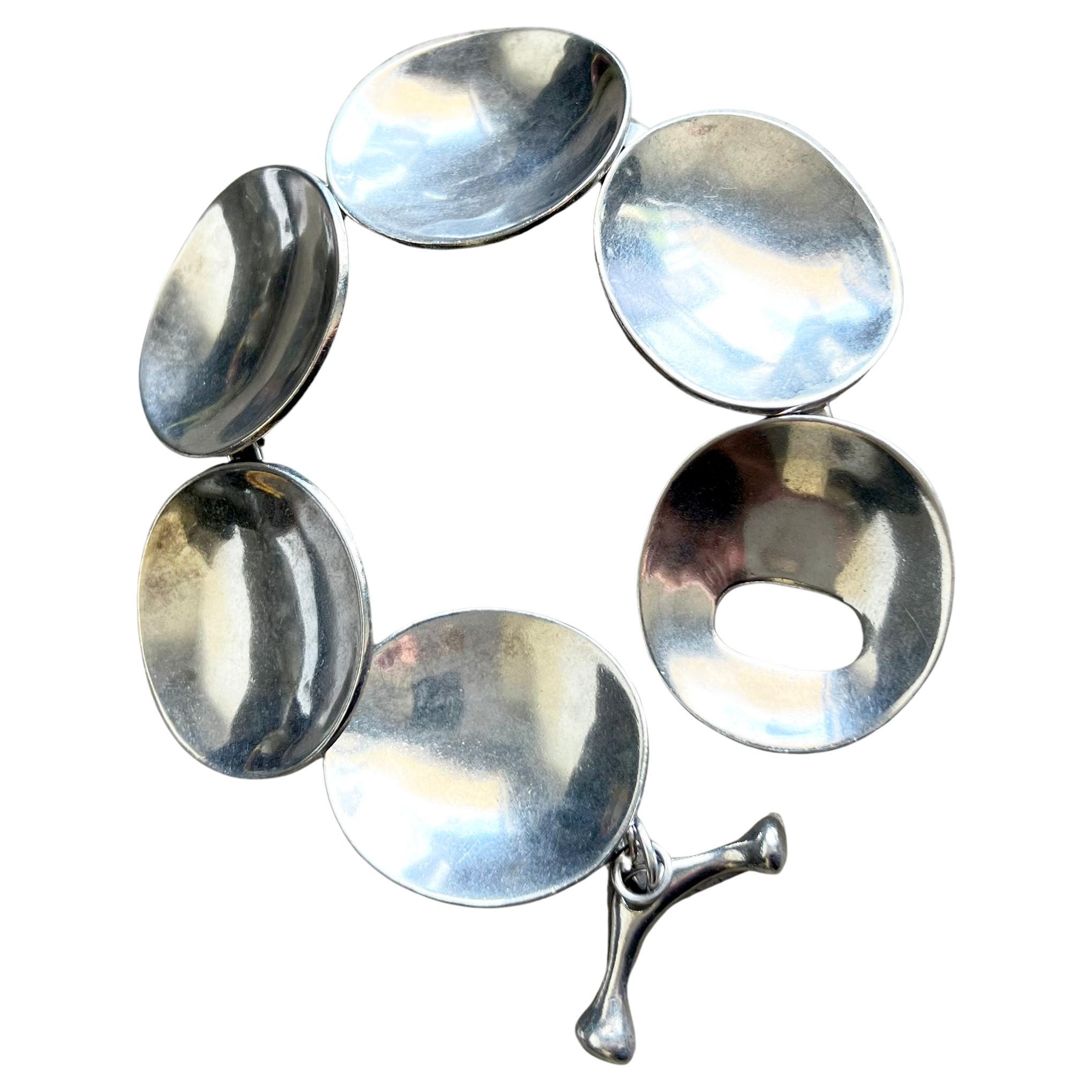 Modernist 1980s Robert Lee Morris Sterling Silver Concave Disc Bracelet For Sale