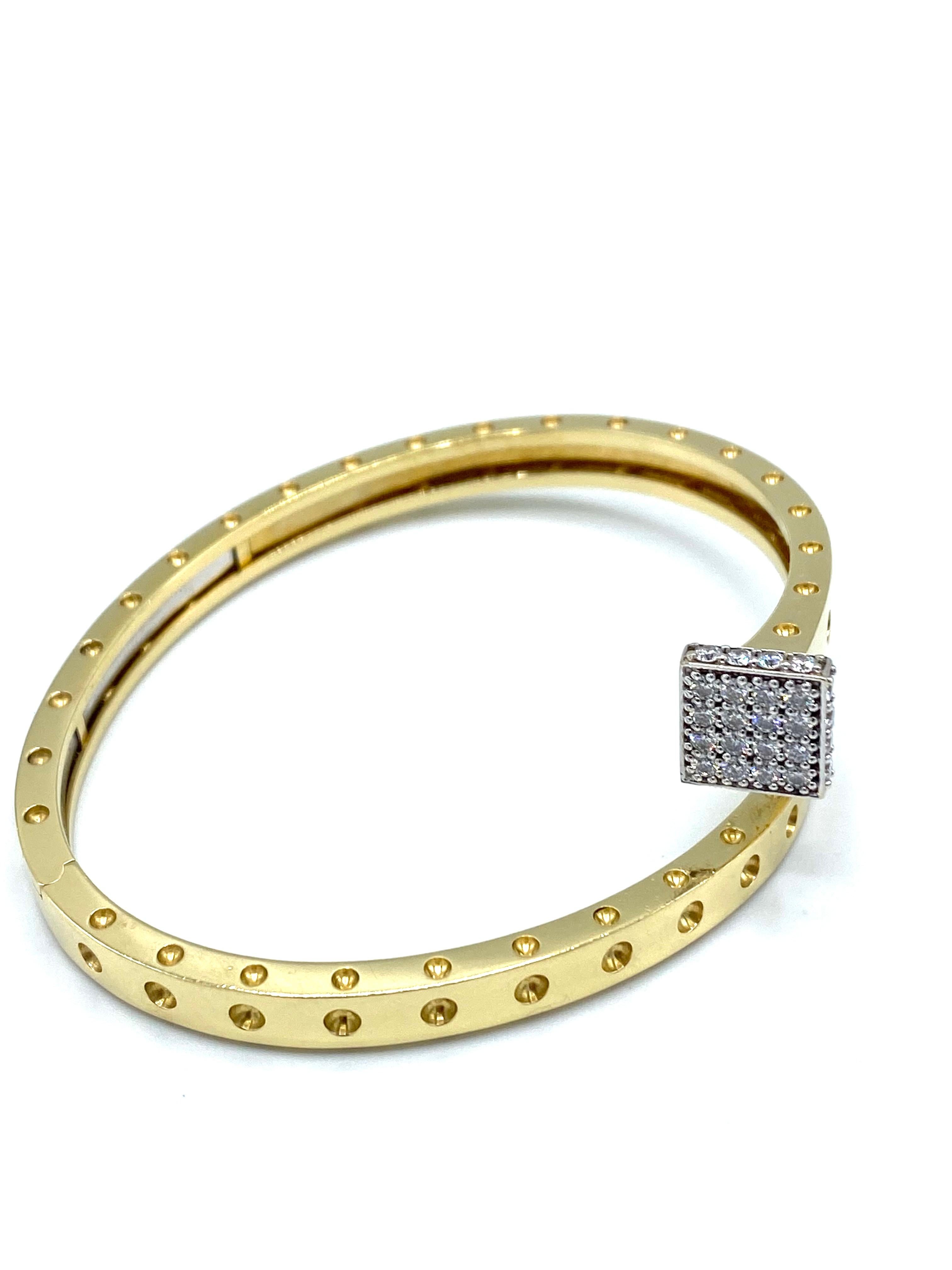 Product details:

The bracelet is designed by Italian designer Roberto Coin. It is made out of 18 karat yellow gold and it features 0.45 cts of round brilliant cut diamonds detail.
Total weight is 25.9 grams.
The inner circumference is 7 inches. 