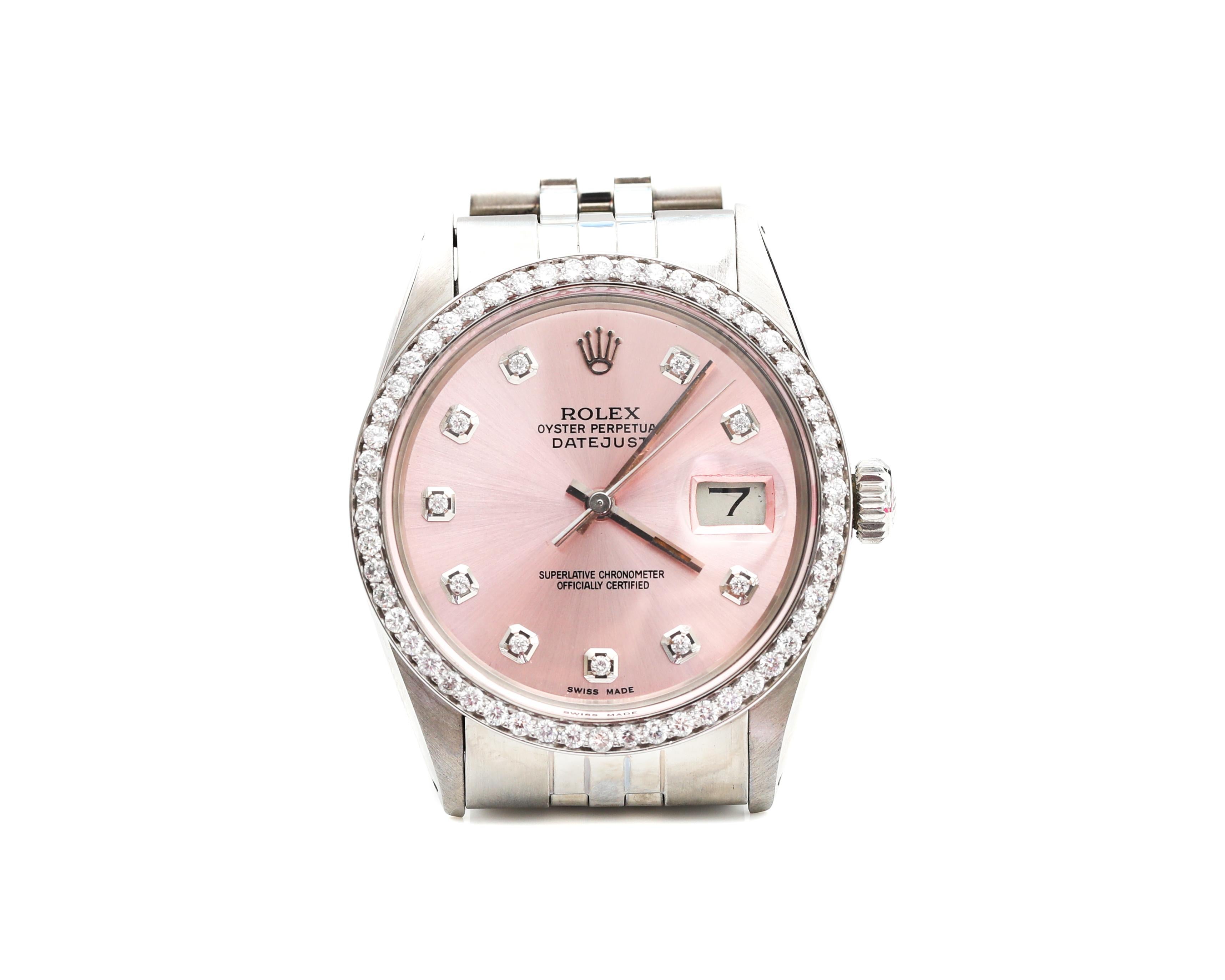 Beautiful Rolex Datejust featuring 2.5 carats of custom diamond dial. There is also a gorgeous salmon pink colored diamond dial. This Rolex has been recently serviced and is running great, in mint condition.

Watch Details:
Metal: 18 Karat White