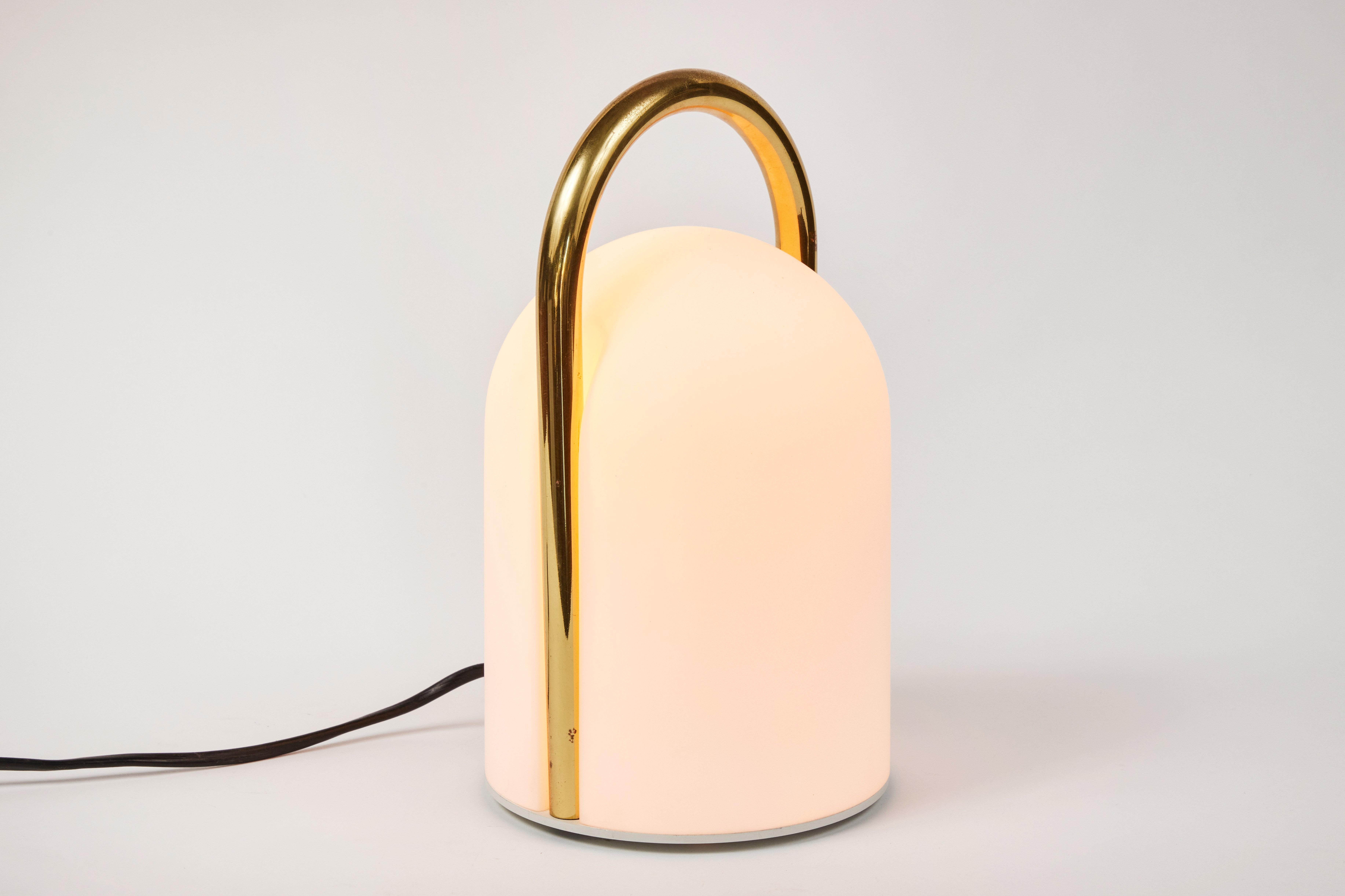 1980s Romolo Lanciani brass and glass 'Tender' table lamps for Tronconi. Executed in opaline glass and rare brass finish, Italy, circa 1980s.

Tronconi was a major Italian lighting and design company founded by Enrico Tronconi. Previously Tronconi
