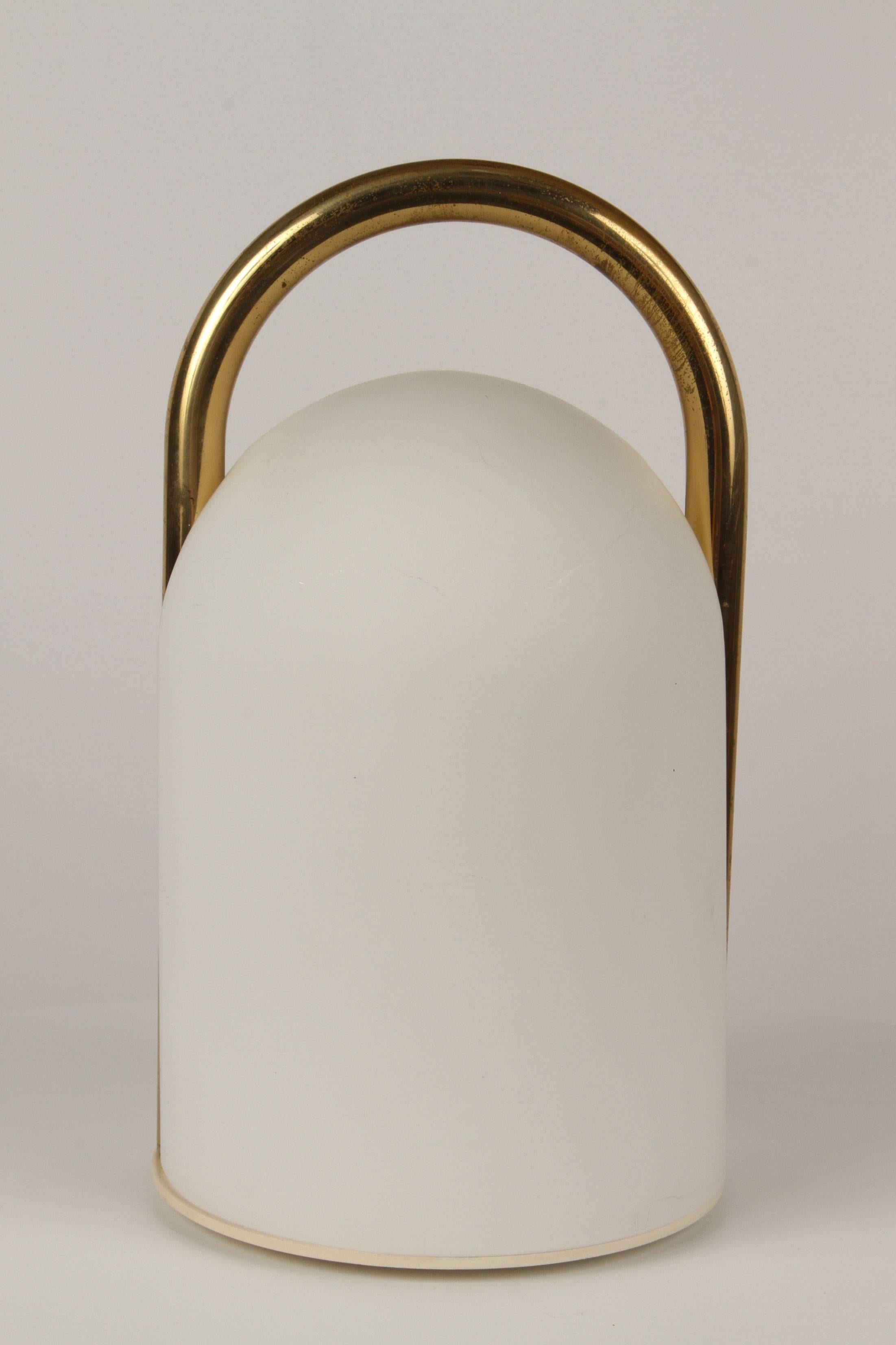 1980s Romolo Lanciani brass and glass 'Tender' table lamps for Tronconi. Executed in opaline glass and rare brass finish, Italy, circa 1980s.

Price is for the pair.

Tronconi was a major Italian lighting and design company founded by Enrico