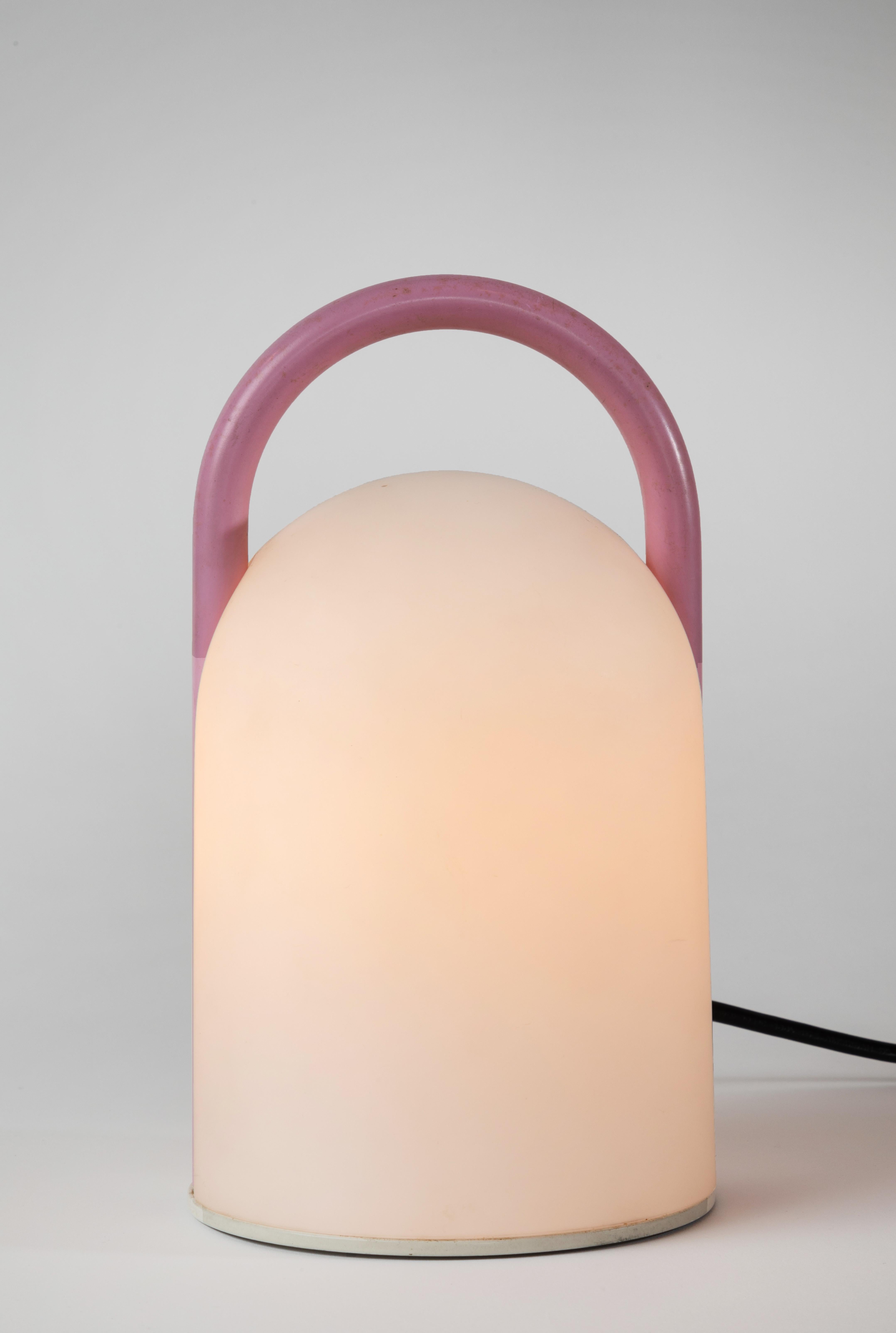 1980s Romolo Lanciani 'Tender' glass table lamp for Tronconi. Executed in opaline glass and rare pink/mauve enameled metal finish, Italy, circa 1980s.

Tronconi was a major Italian lighting and design company founded by Enrico Tronconi. Previously