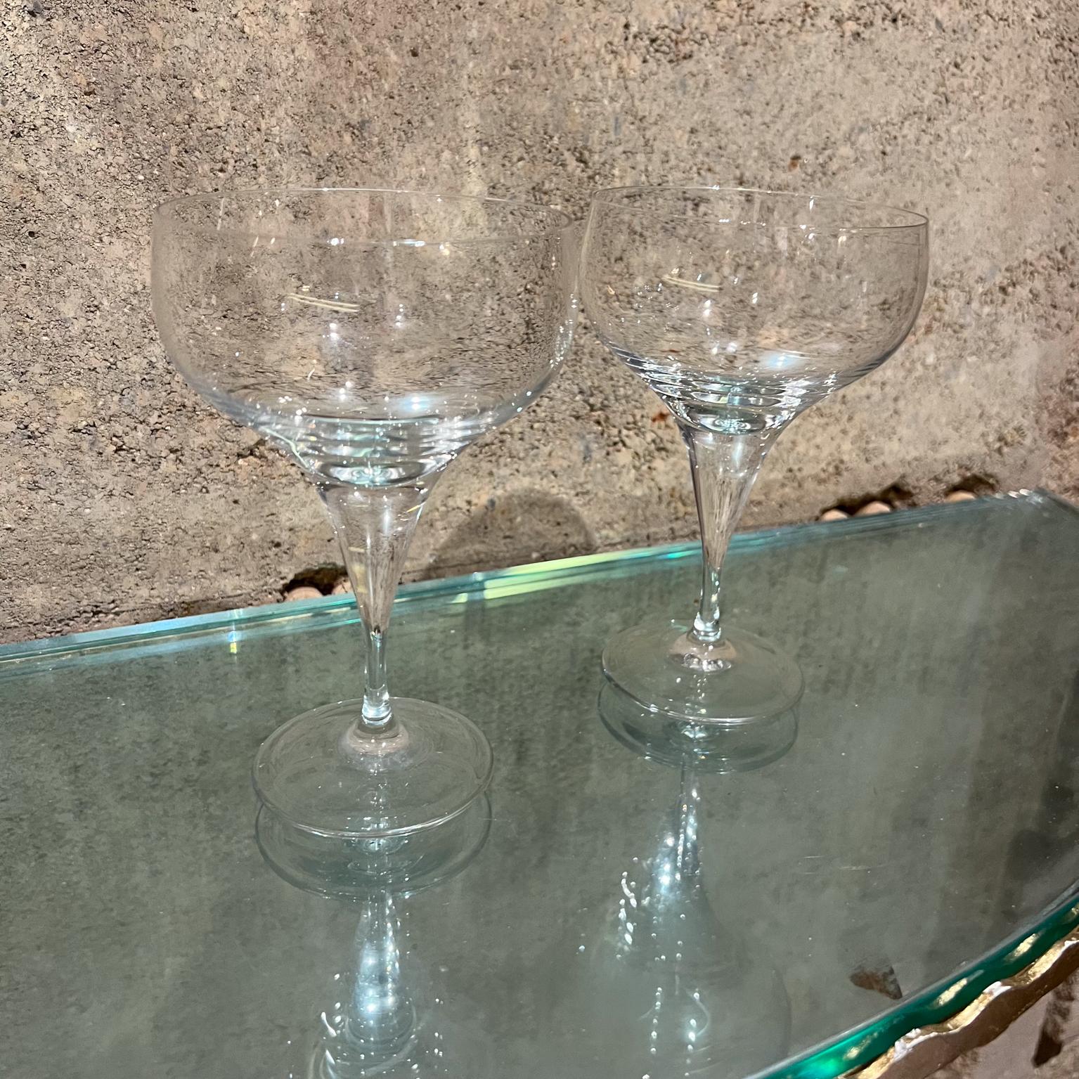 
1980s Rosenthal Crystal Champagne Glasses Coupe Bjorn Wiinblad
Set of two glasses
6 h x 3.5 diameter
Preowned vintage condition unrestored.
Refer to images.