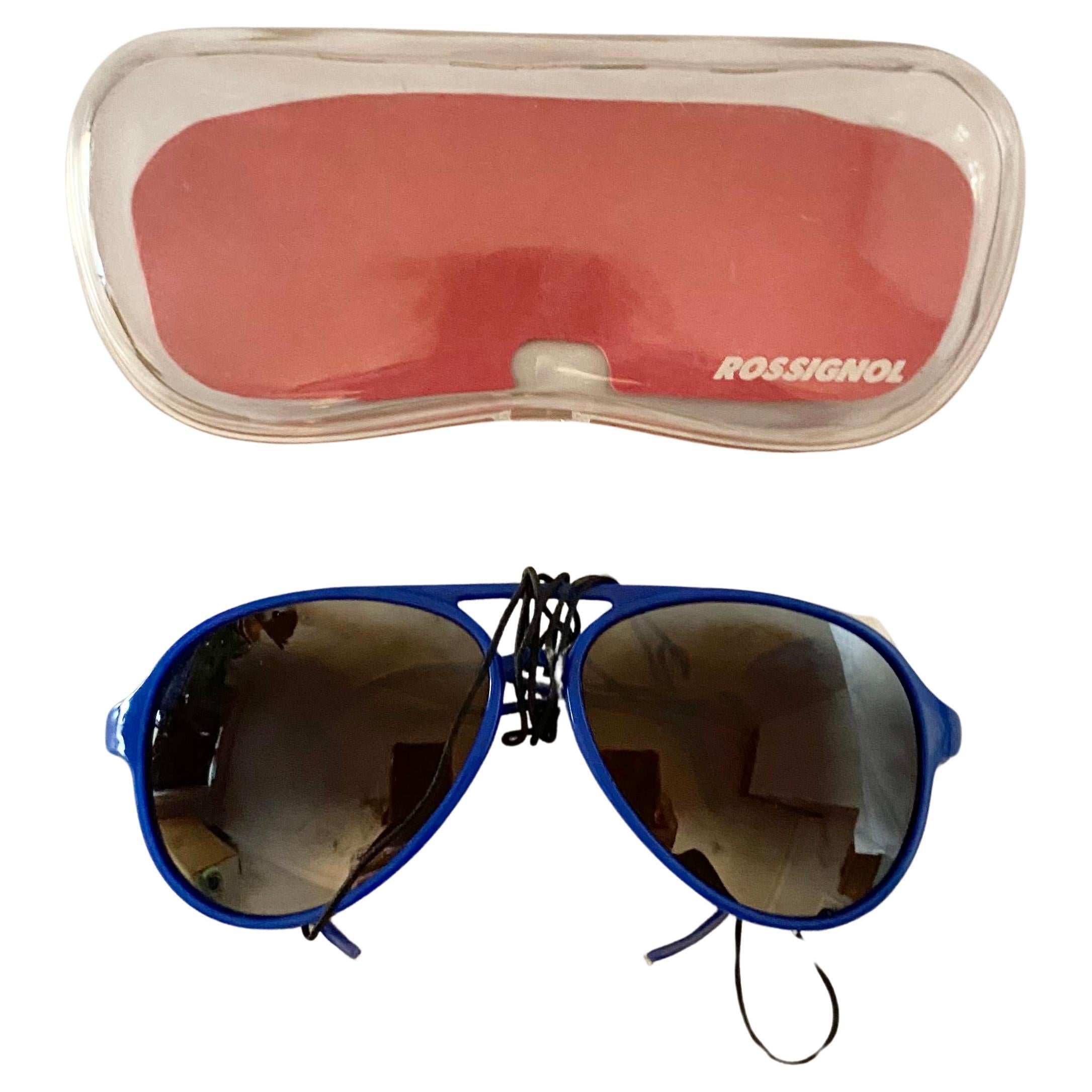 Offering premium protection and a secure fit, Rossignol's Mirrored Blue Frame Sunglasses, boasting white leather side shields and gradient dark brown lenses, are crafted in France to fit men and women alike, and boast adjustable temple ends, perfect