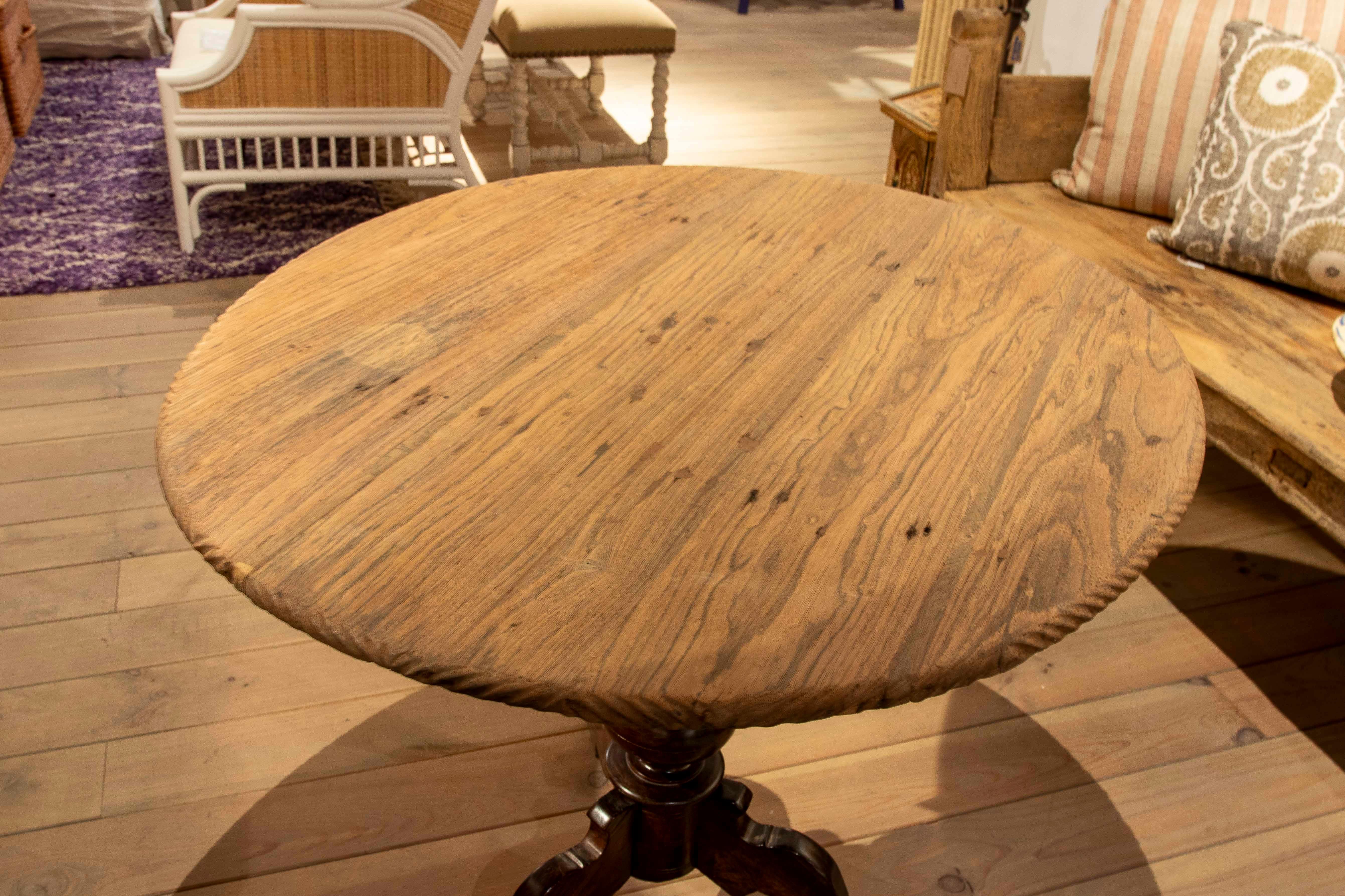 Spanish 1980s Round Table with Turned Wooden Base and Top in its Natural Color For Sale