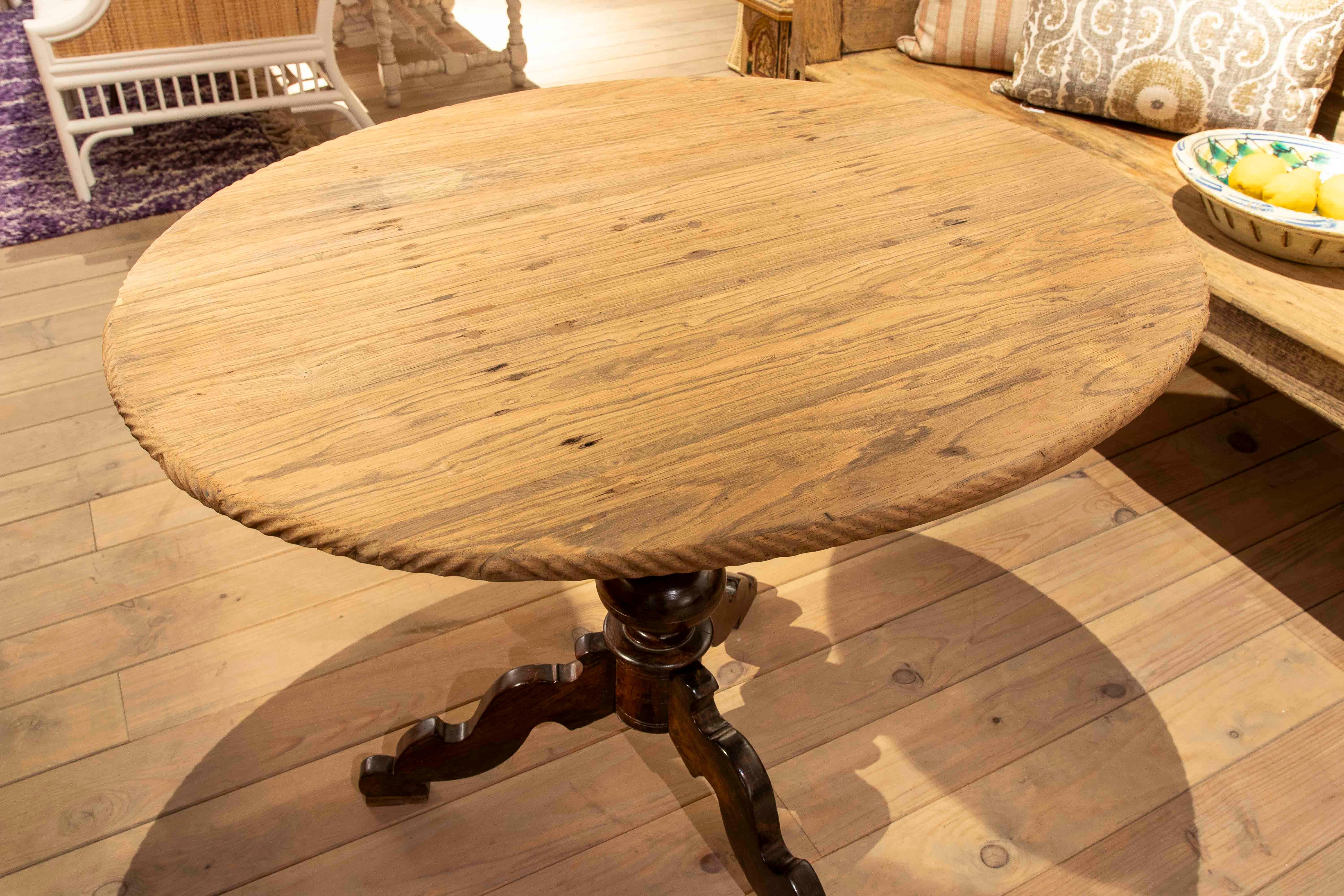 Late 20th Century 1980s Round Table with Turned Wooden Base and Top in its Natural Color For Sale