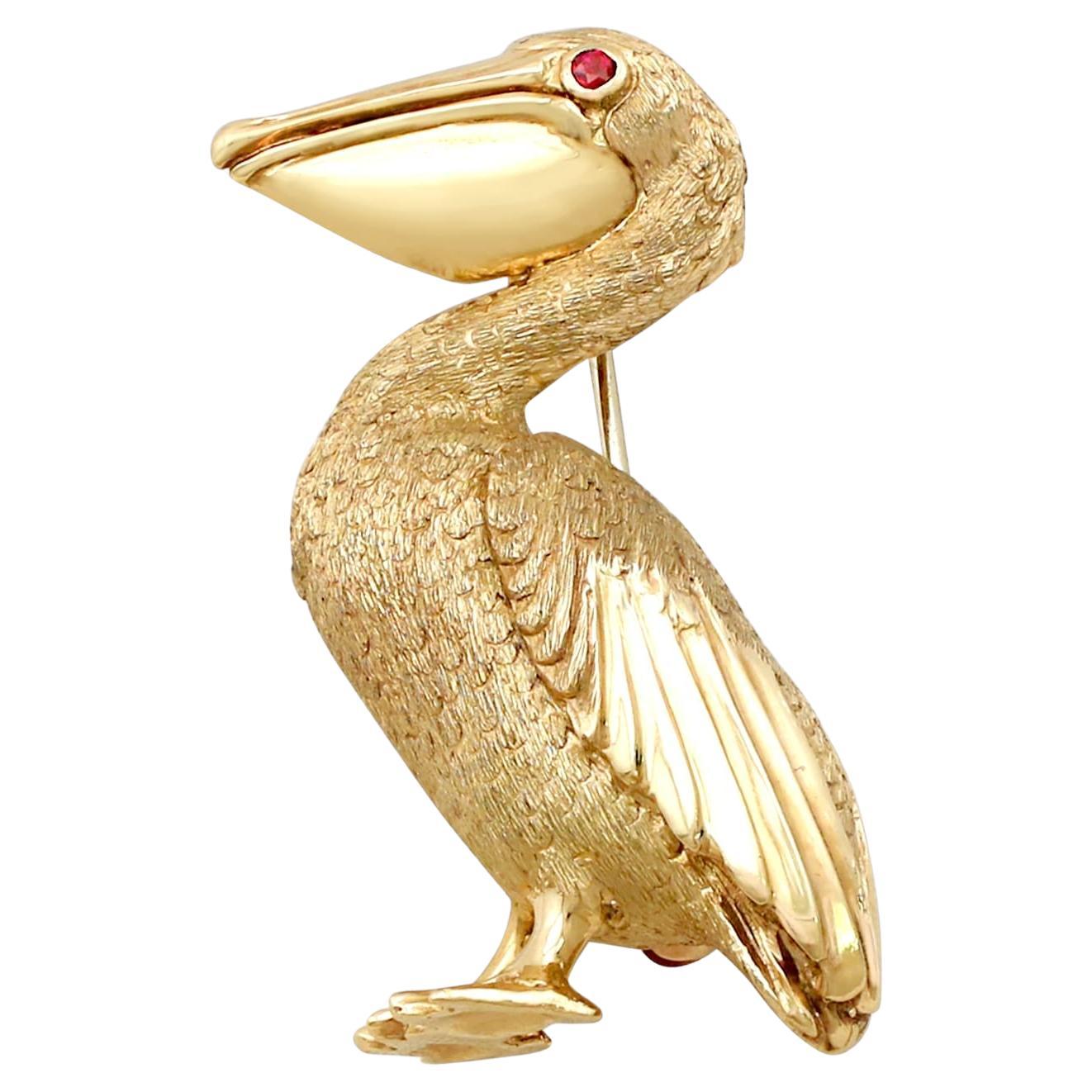 1980s Ruby and Yellow Gold Pelican Brooch For Sale