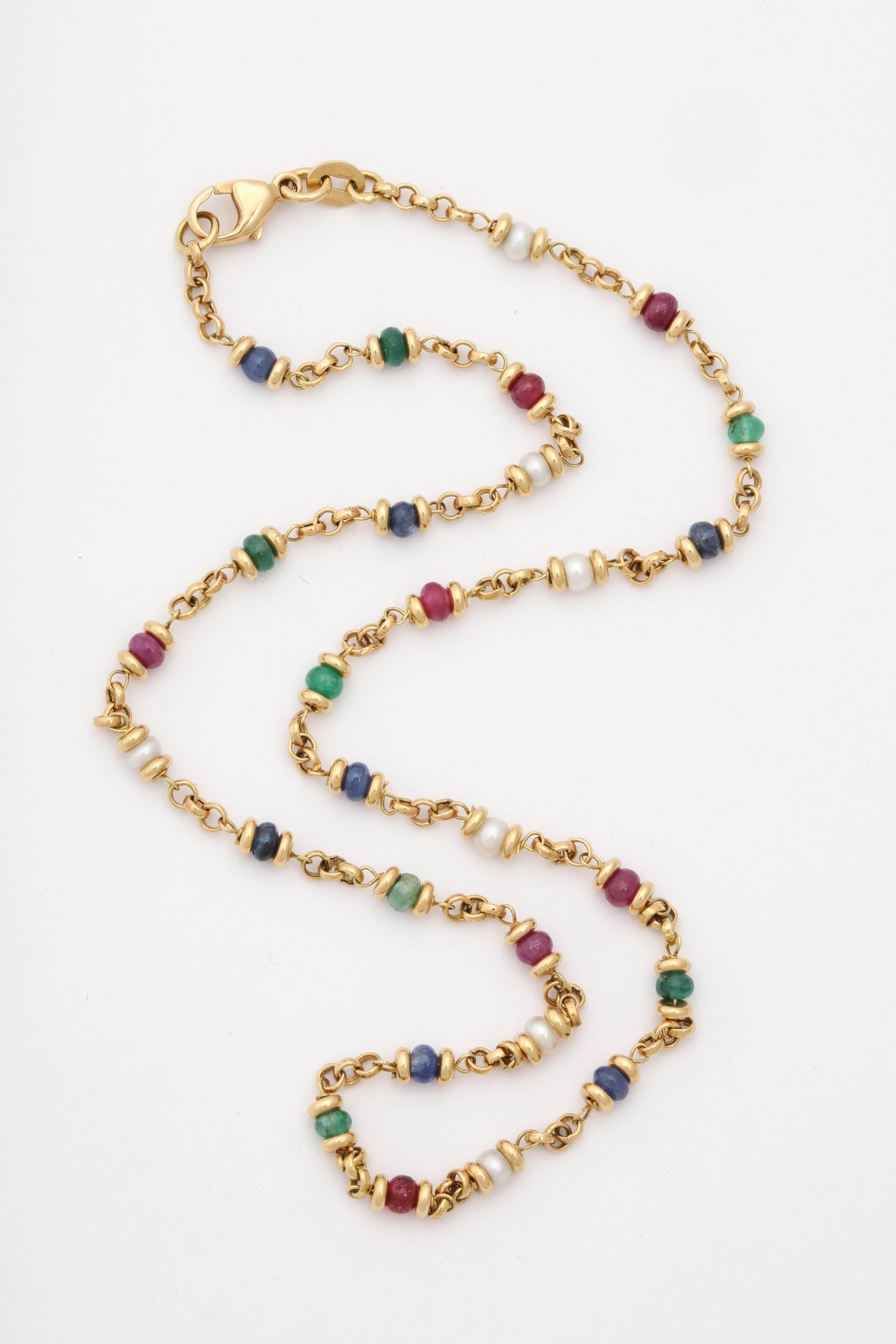 One 18kt Yellow Gold Open Link Chain Necklace Designed With Alternating Emerald,Ruby,Sapphire And Pearl Beads. Created In Italy In The 1980's With A Beautiful Easy To Use Lobster Clasp.