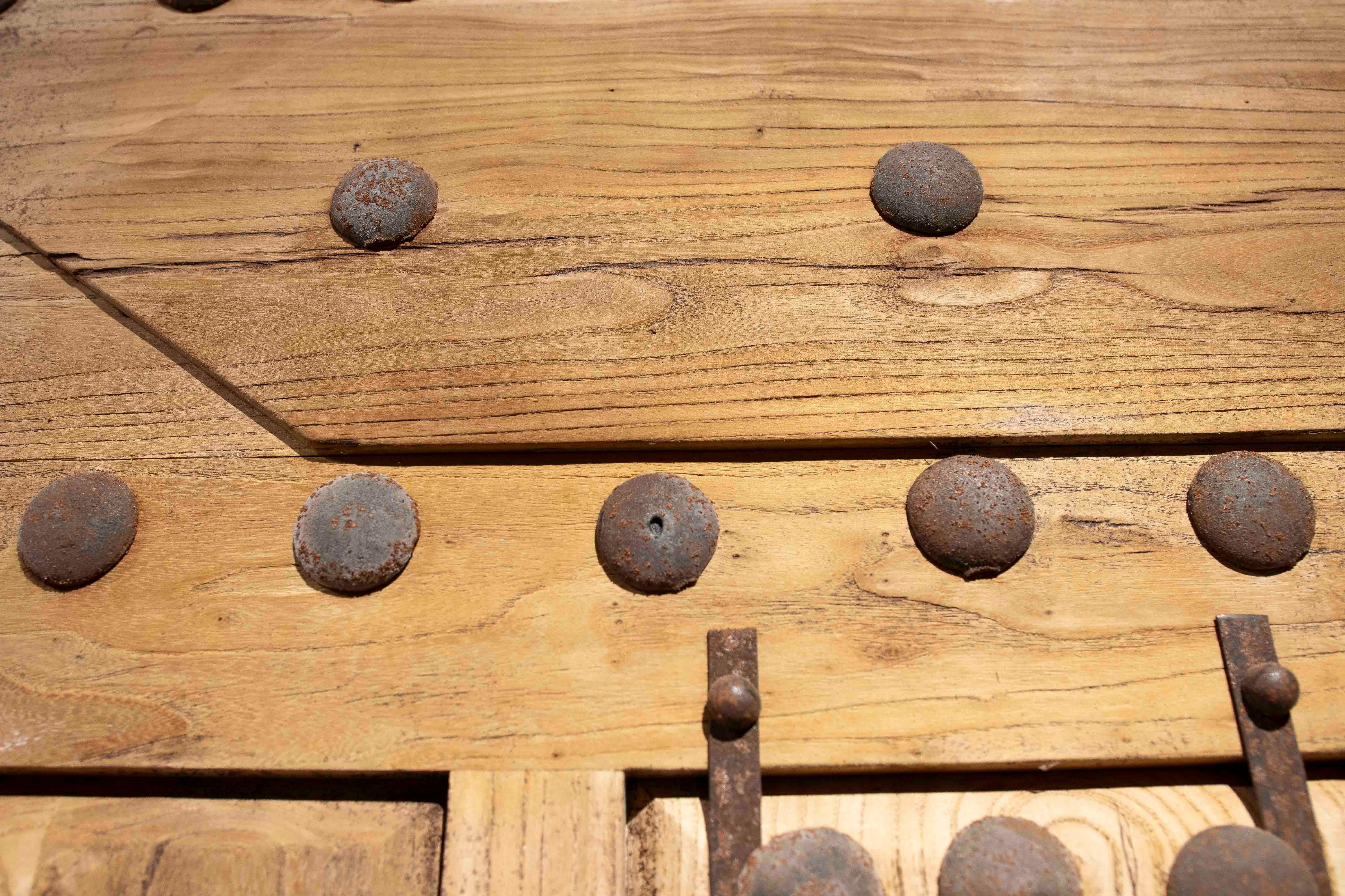 1980s Rustic Elm Wood Door with Nails and Decorative Grille For Sale 6