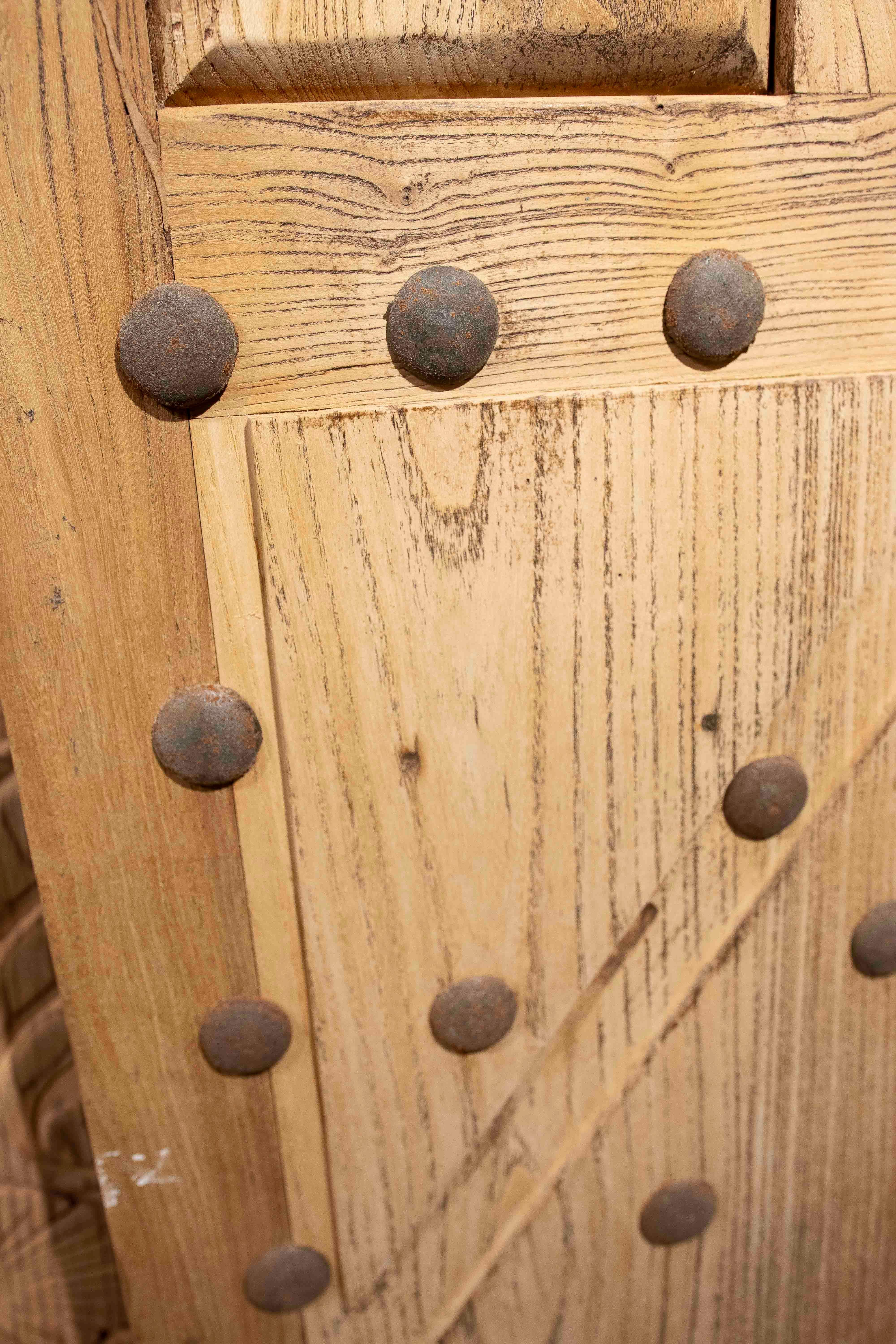 1980s Rustic Elm Wood Door with Nails and Decorative Grille For Sale 1