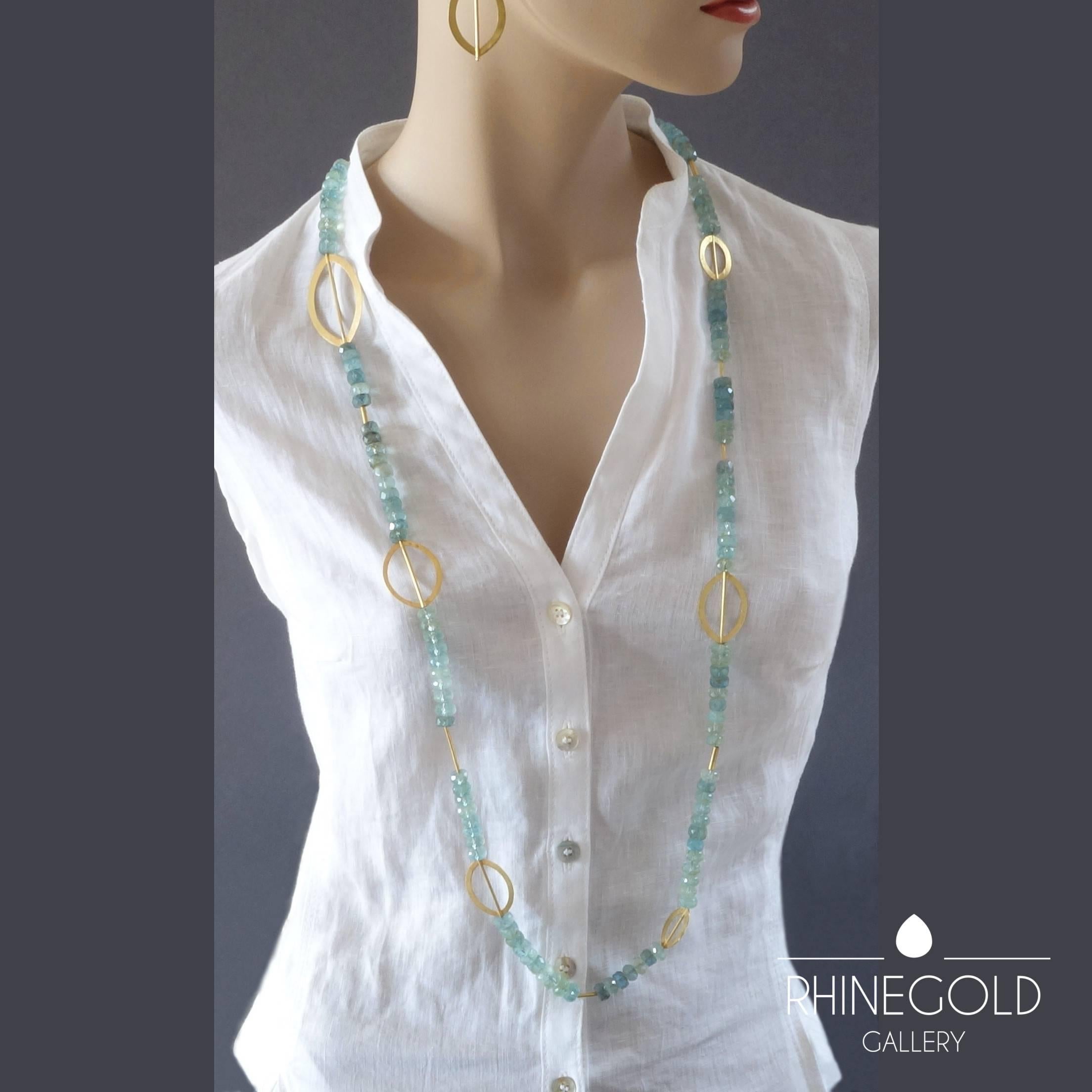 Sabine Strobel Post-Modernist Aquamarine Gold Long Chain Necklace
18k yellow gold, aquamarine
Length 115.5 cm (approx. 45 ½”), width (max.) 3.2 cm (approx. 1 ¼”), aquamarine beads ca. 1.0 cm (approx. 3/8”)
Weight approx. 138.3 grams
Marks: maker’s