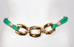1980's SAINT LAURENT green woven cord belt with gilt bamboo buckle
