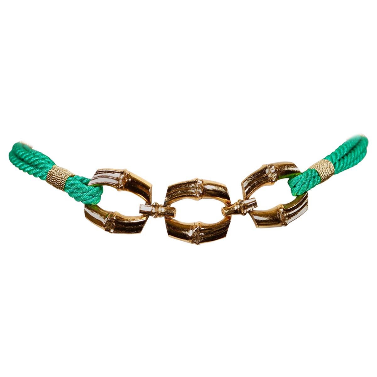 SAINT LAURENT Ceinture en cordon tissé vert avec boucle en bambou doré, années 1980