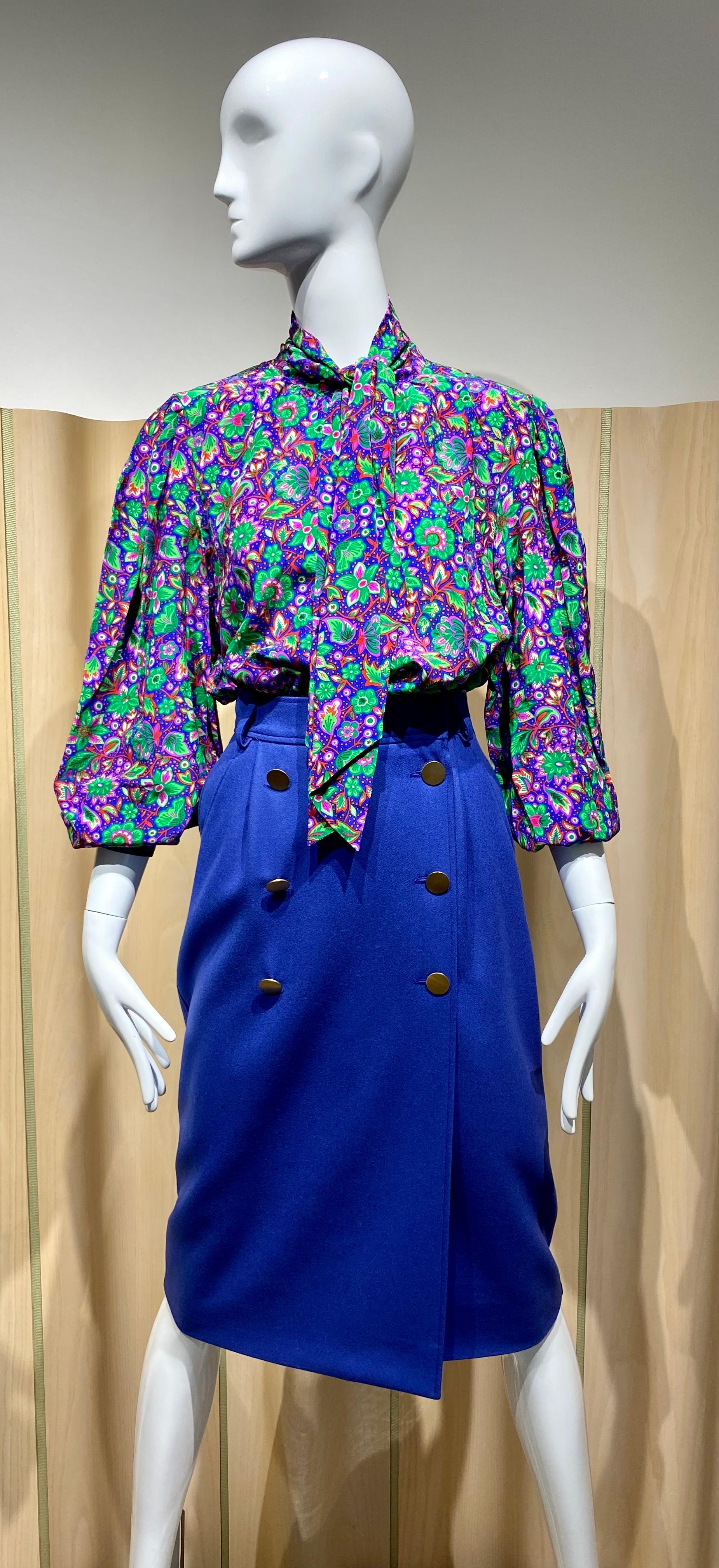Vintage Yves Saint Laurent rive gauche blue, purple and green floral print long sleeve blouse.
Label marked size 40
