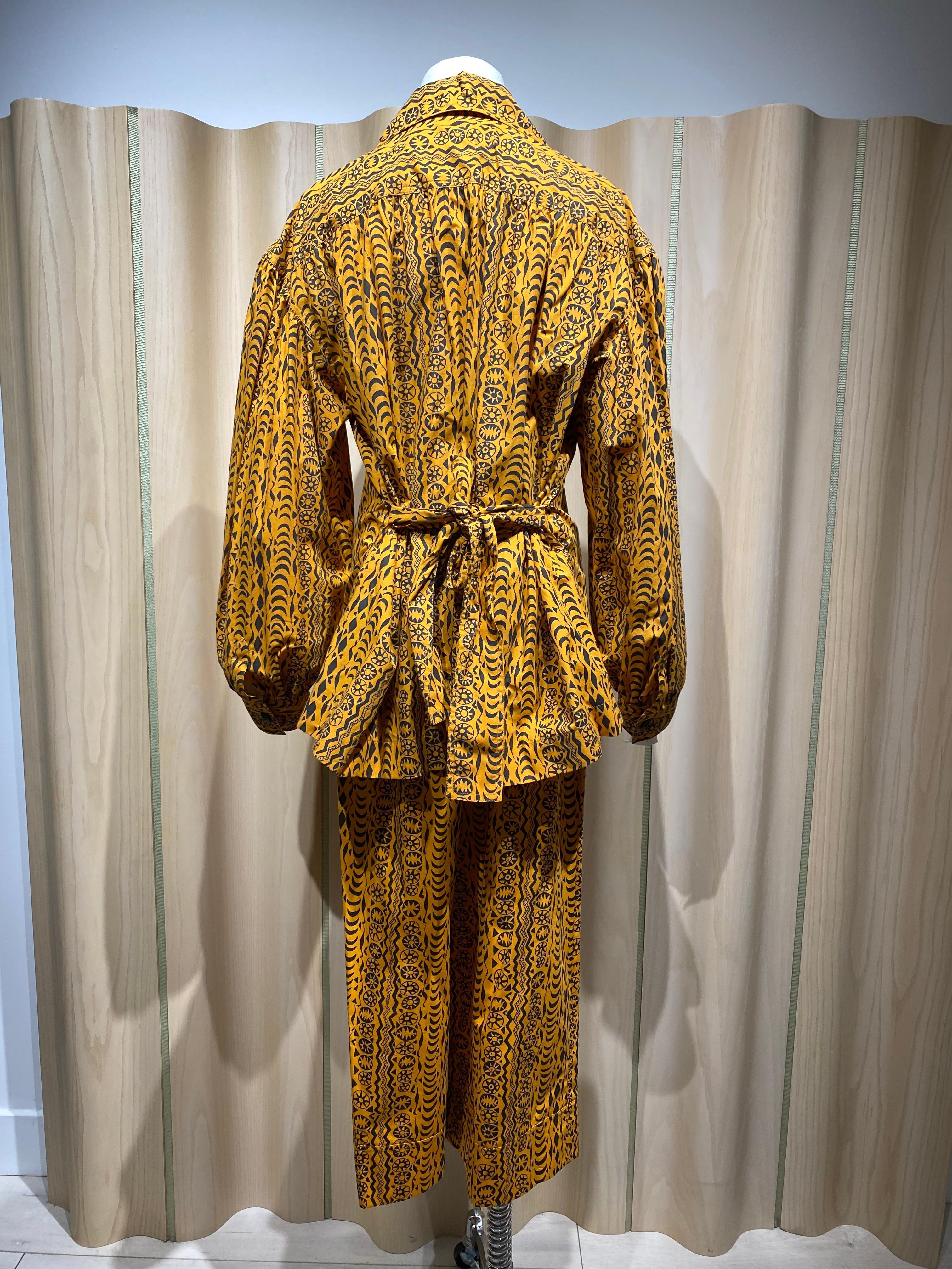 Women's or Men's 1980s Saint Laurent Orange and Black African Print Cotton Blouse and Pant sets