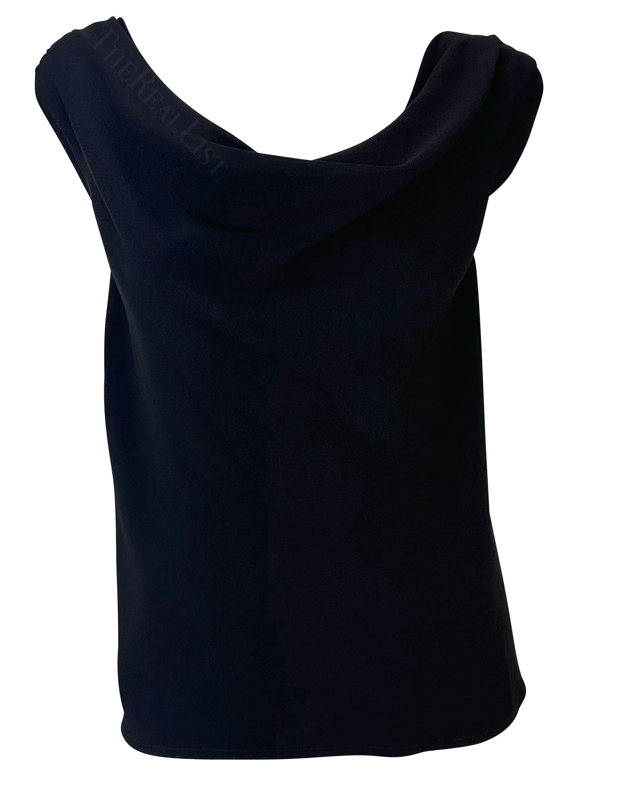 Presenting a chic black Saint Laurent Rive Gauche top, designed by Yves Saint Laurent. From the 1980s, this sleeveless top features a wide scoop neckline, cowl neck, and off-the-shoulder petal sleeves. Perfectly timeless, this vintage top is a