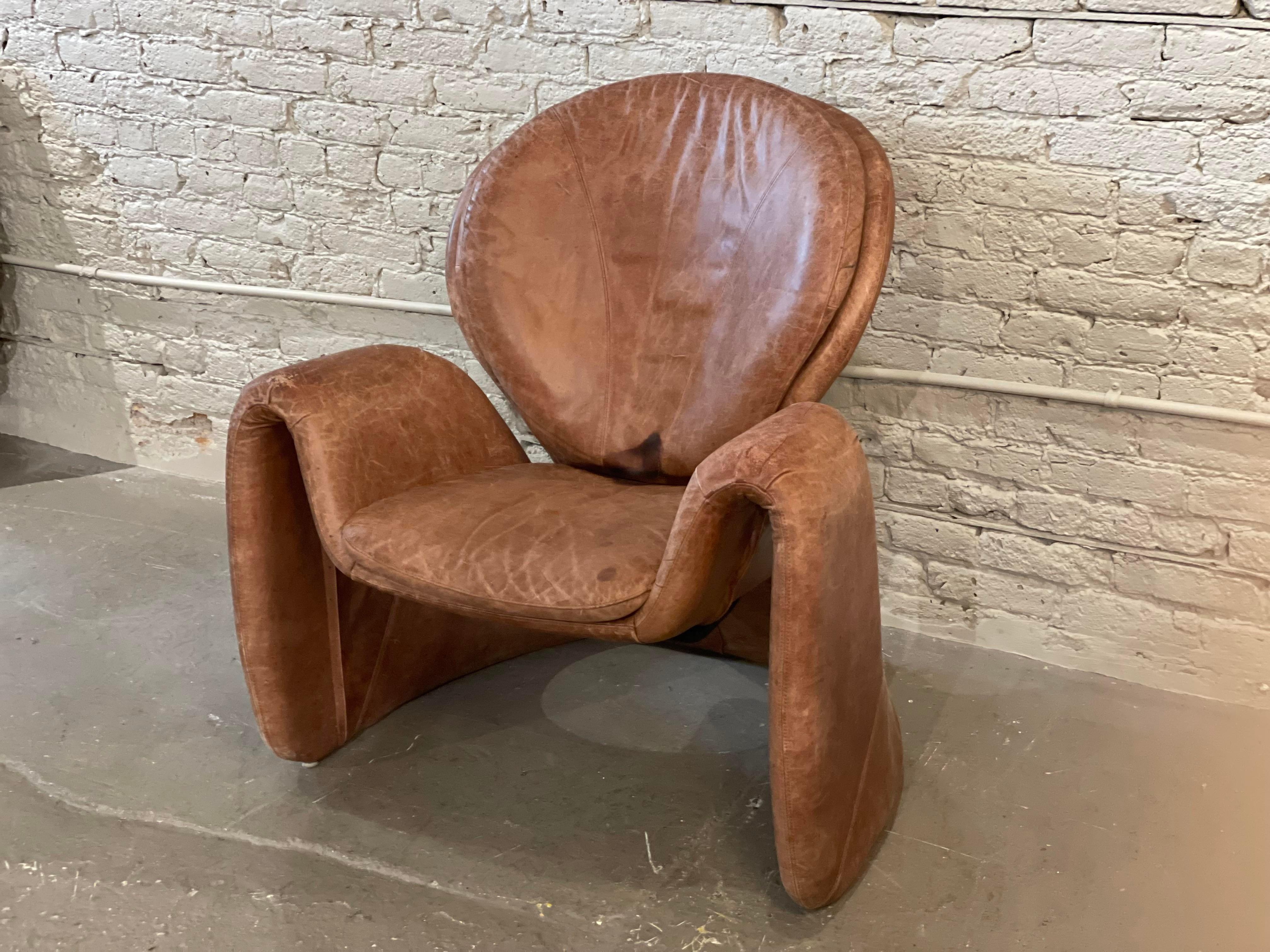 Stunning, sculptural, and comfortable. Still not sure if I want to sell this:)

No labels but in the style of Jaymar. The leather is gorgeous but has markings as shown. Perhaps a good cleaning?
  