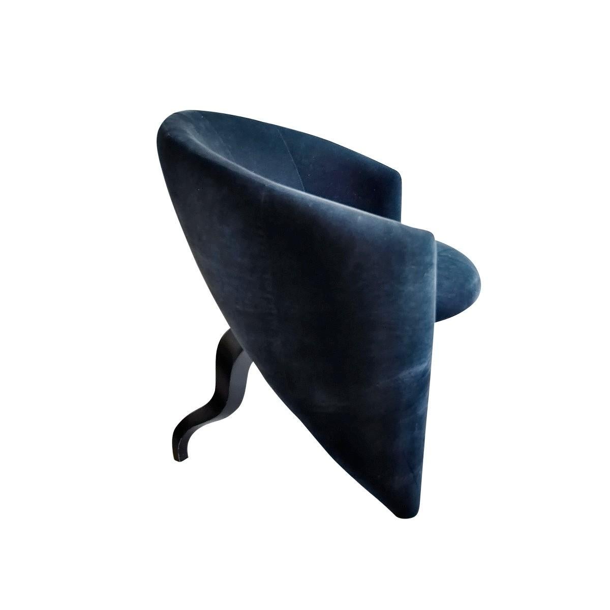 Amazingly unique and highly stylized sculptural chair featuring three-leg frame and original black velvet fabric. Round seat cushion features a tonal black on black abstract pattern and the rest of the frame is in a solid black velvet upholstery.