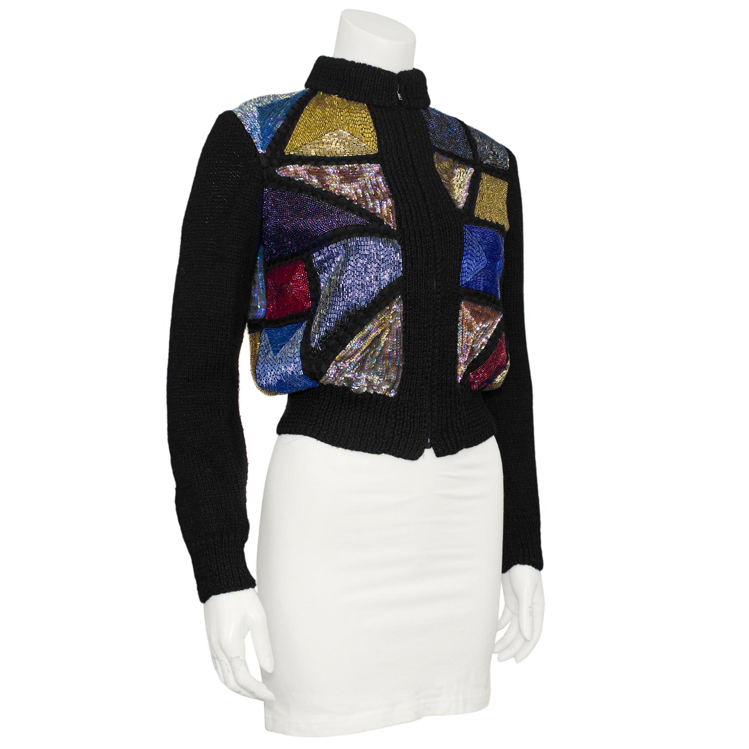 Amazing sequin stained glass window patchwork pattern sweater from the 1980s. The beaded patchwork features sequins, seed beads and bugle beads in gold, blue, purple, red, gunmetal and iridescent.  The interior of the body is lined in black rayon.