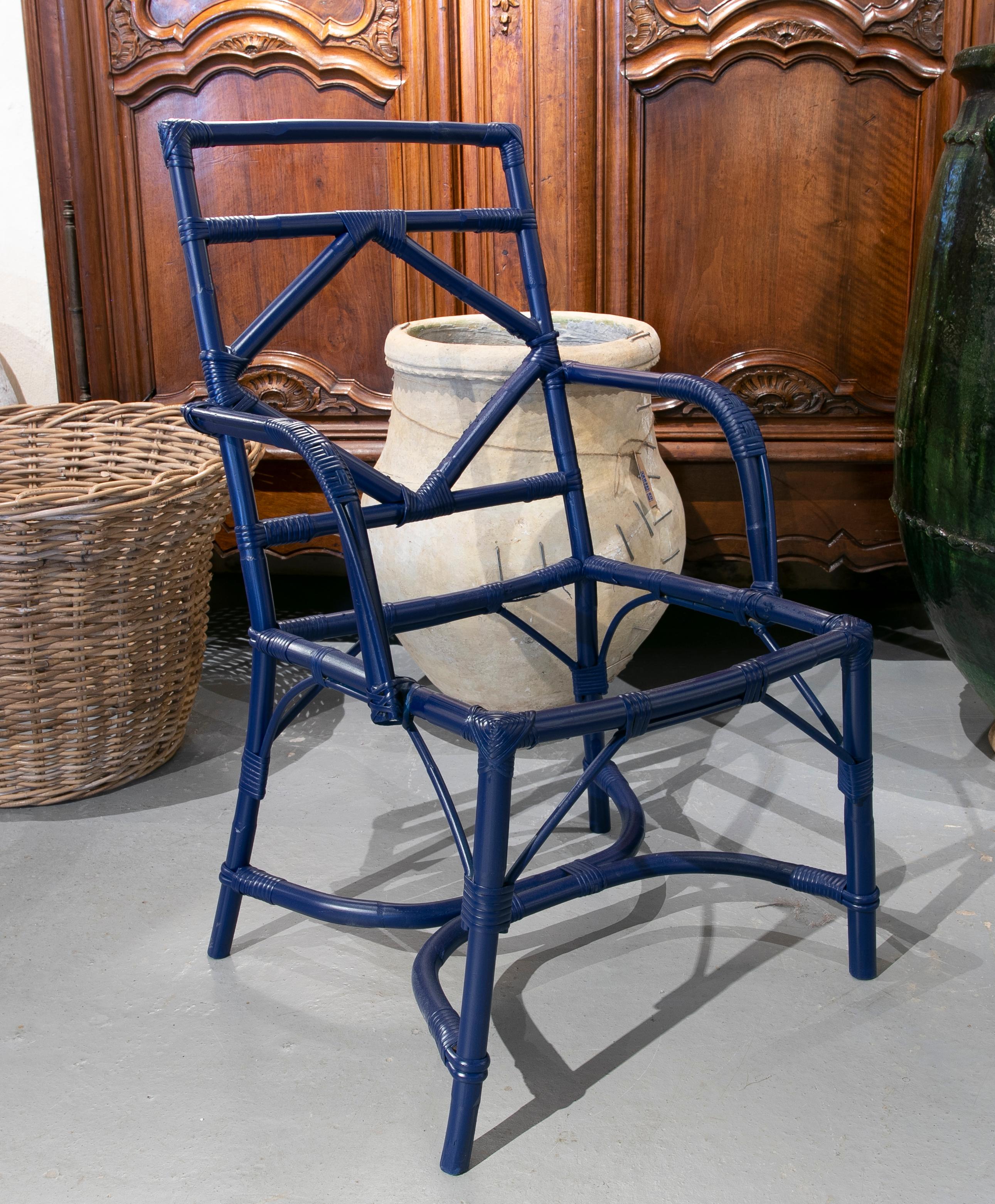 1980s set of eight bamboo and wicker chairs painted in blue.
