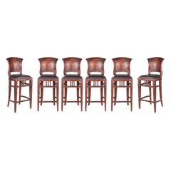 1980s Set of Eight French Leather Upholstered Wooden Stools