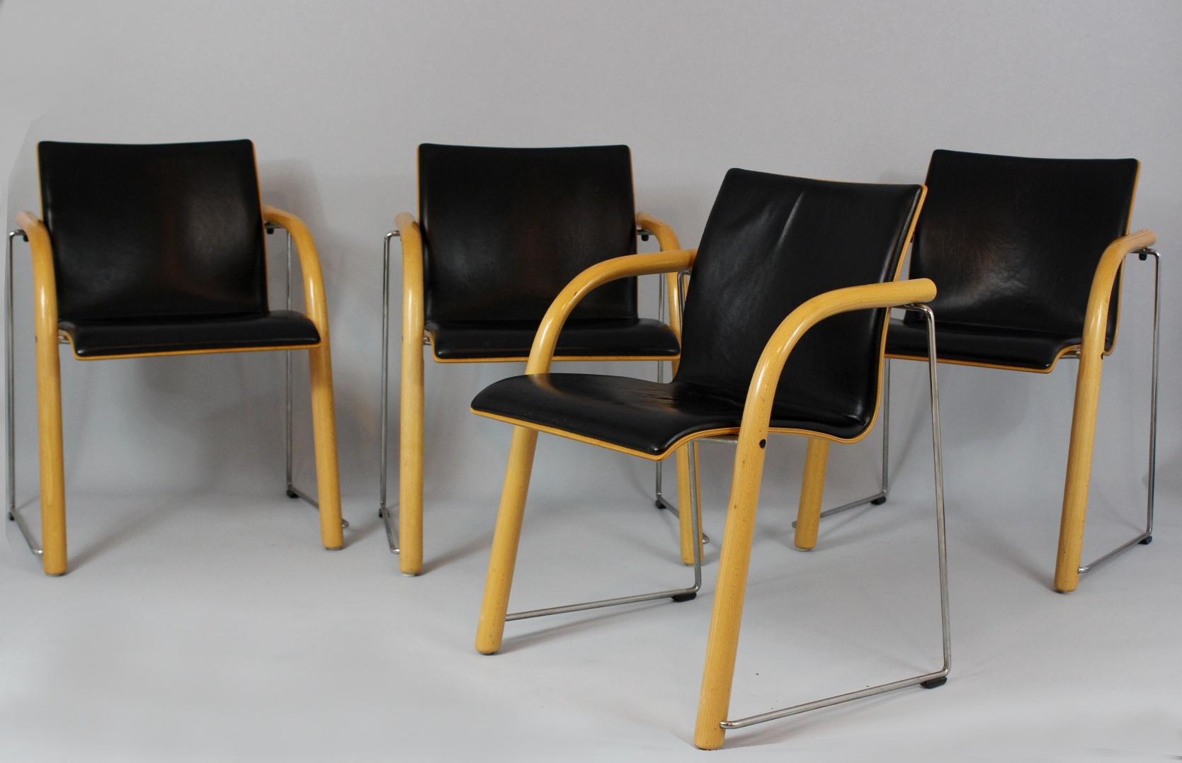 Set of four stocking chairs designed by Wulf Schneider and Ulrich Böhme in 1984 for Thonet. Material is plywood, worn leather and steel.