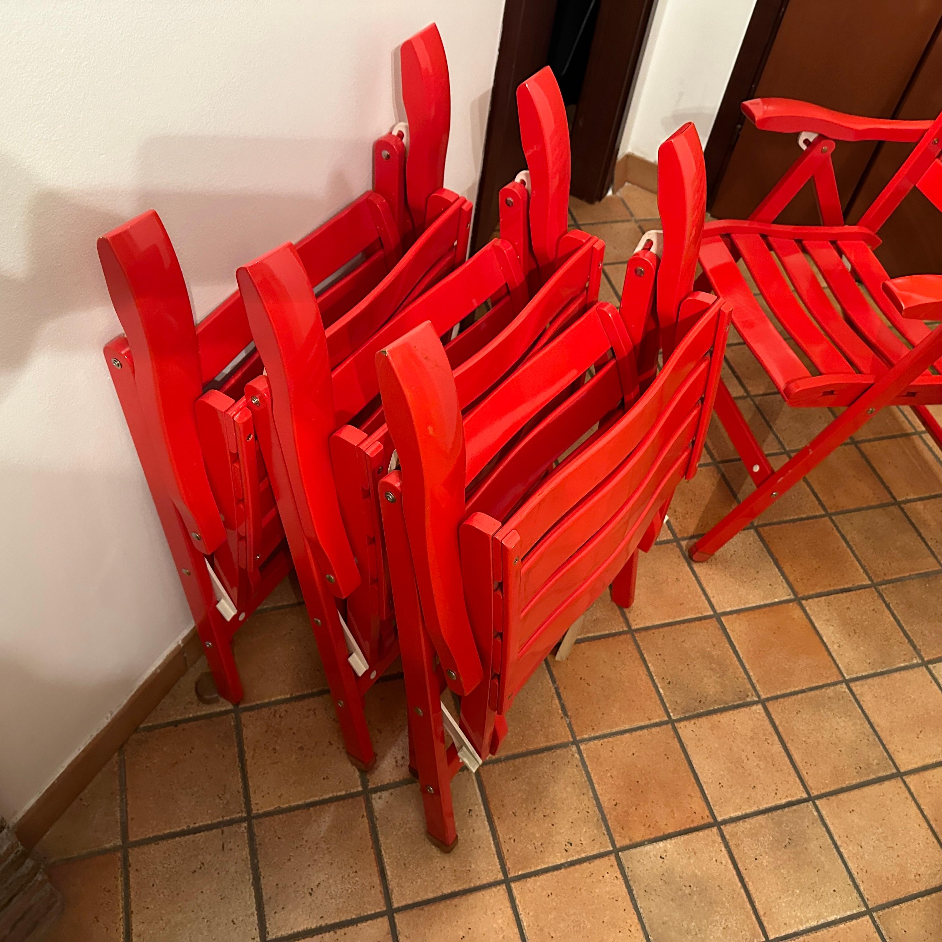 Ensemble de quatre chaises de jardin pliantes orange de style Reguitti des années 1980 en vente 5
