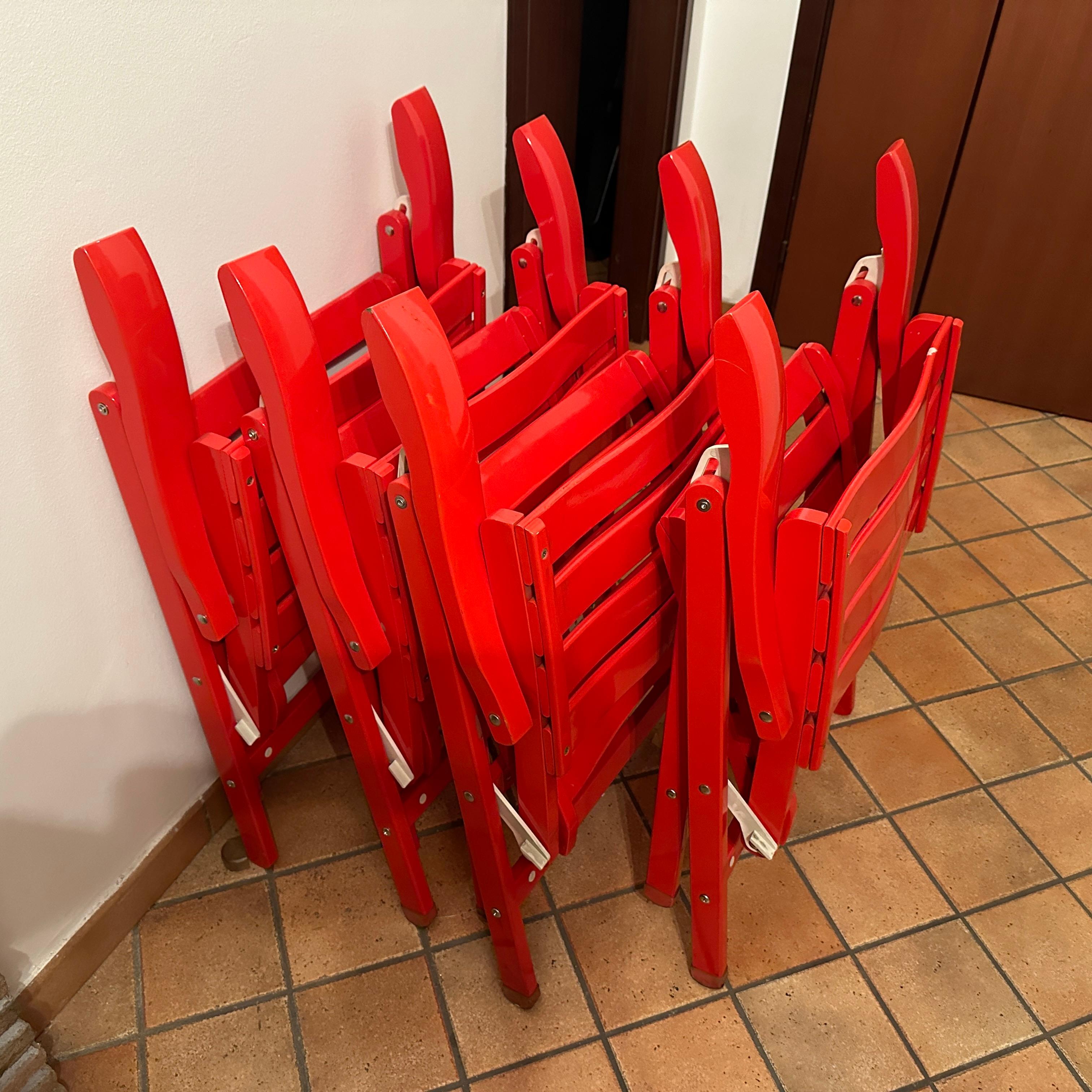 20ième siècle Ensemble de quatre chaises de jardin pliantes orange de style Reguitti des années 1980 en vente