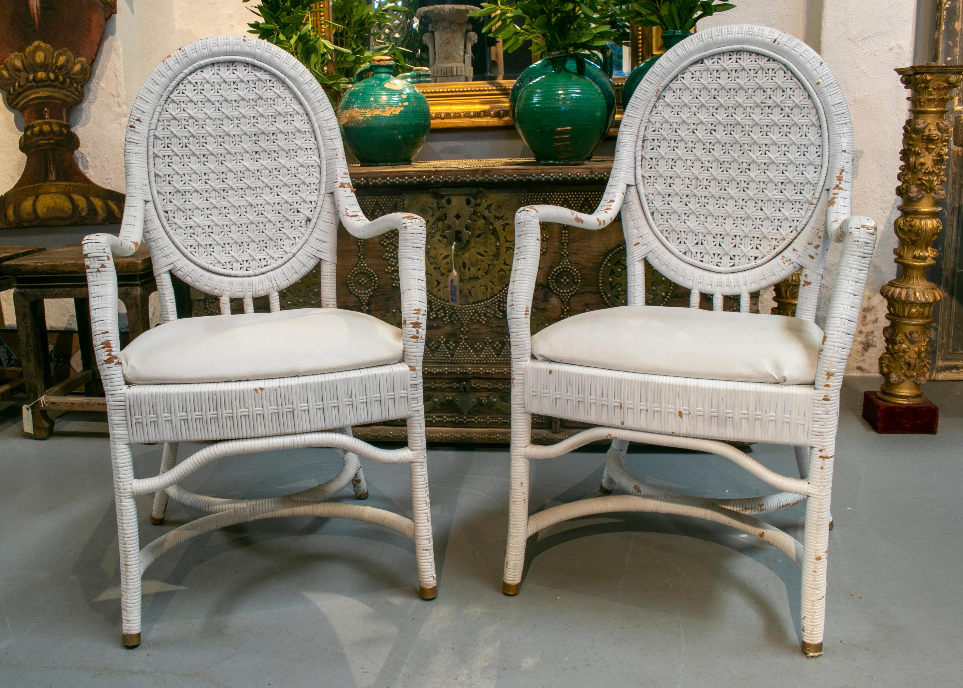 1980s set of four Spanish handmade wicker armchairs.