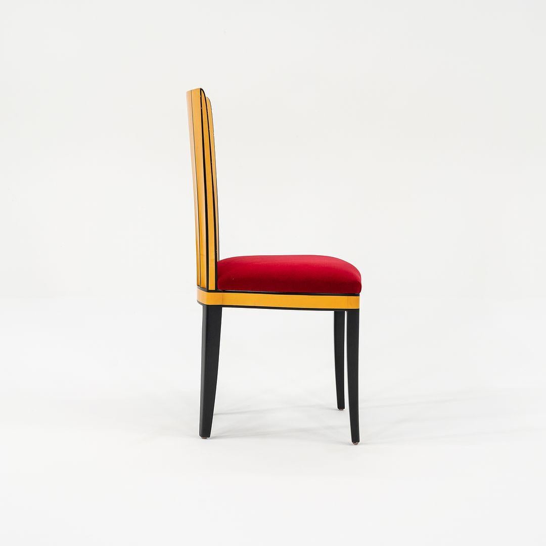 Il s'agit d'un ensemble de 10 chaises de salle à manger sans accoudoirs en érable laqué de style Art déco, initialement conçues par l'architecte finlandais Eliel Saarinen en 1929 pour sa maison de l'Académie d'art de Cranbrook. Cet ensemble