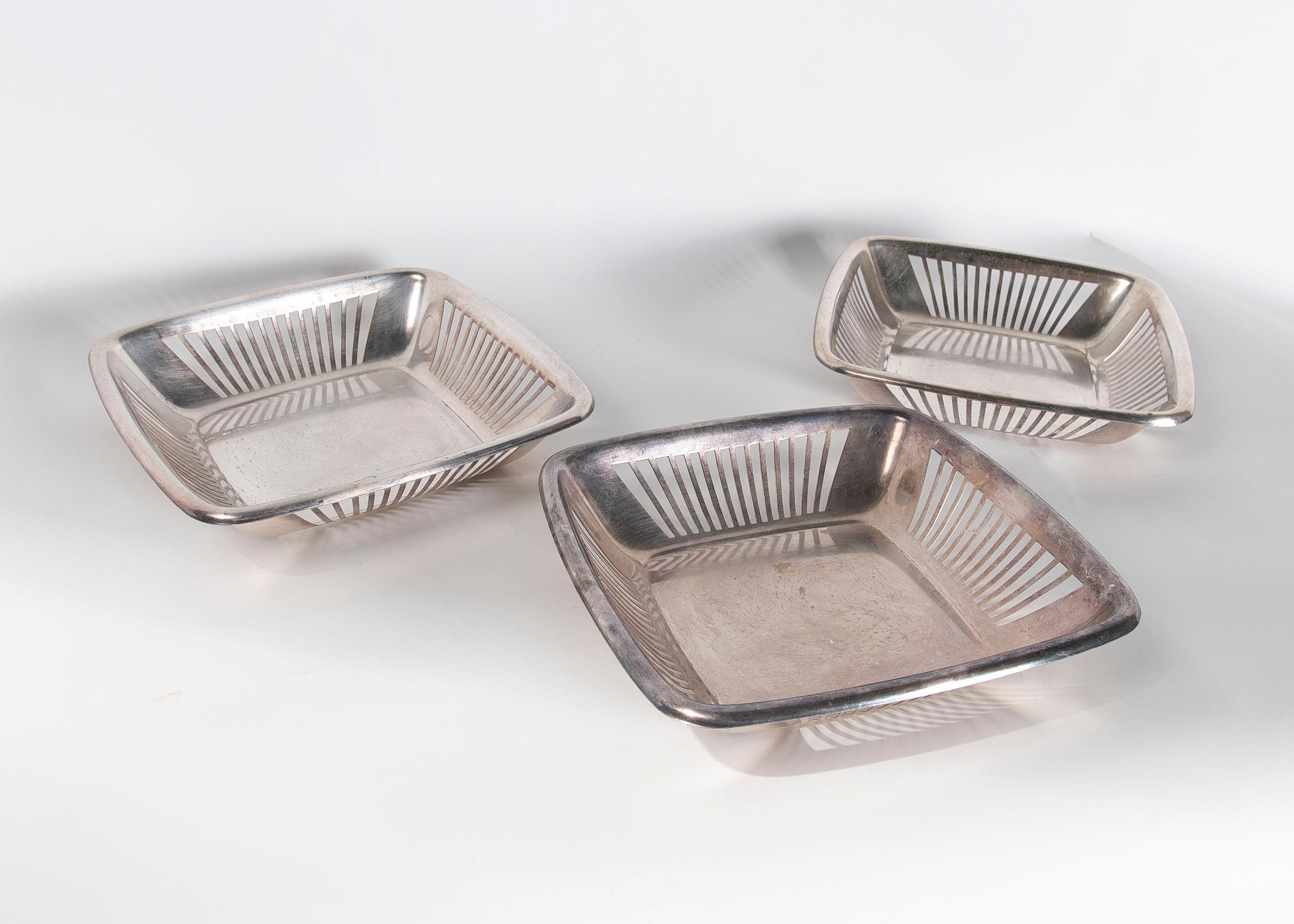 1980s Set of three square silver plated metal trays.