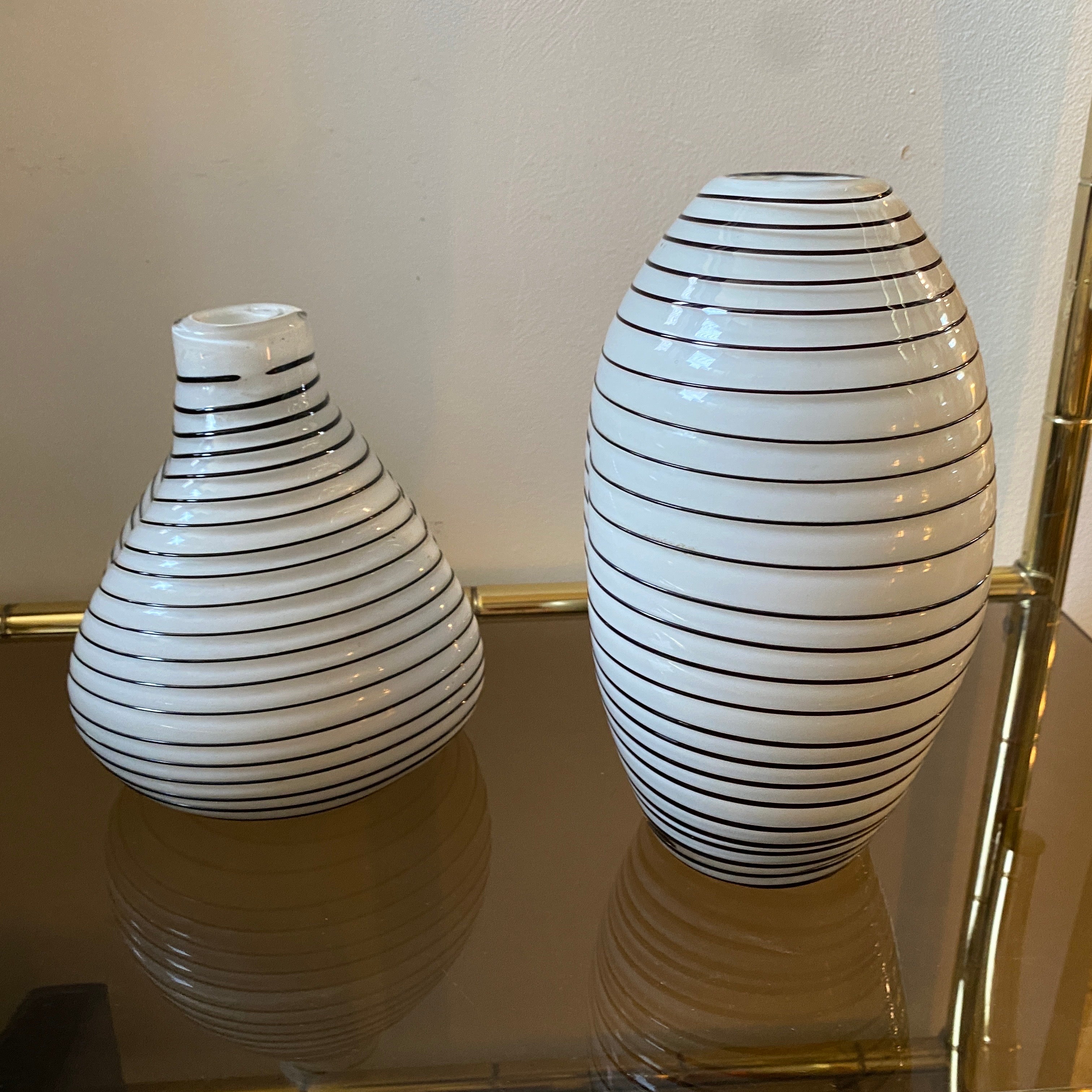 These Murano Glass Vases from the 1980s exhibit a unique combination of artistic flair, craftsmanship, and the distinctive Murano glass-making tradition. 
Dimension of the smallest vase are 19 cm in height and 16 cm in diameter, they are in very