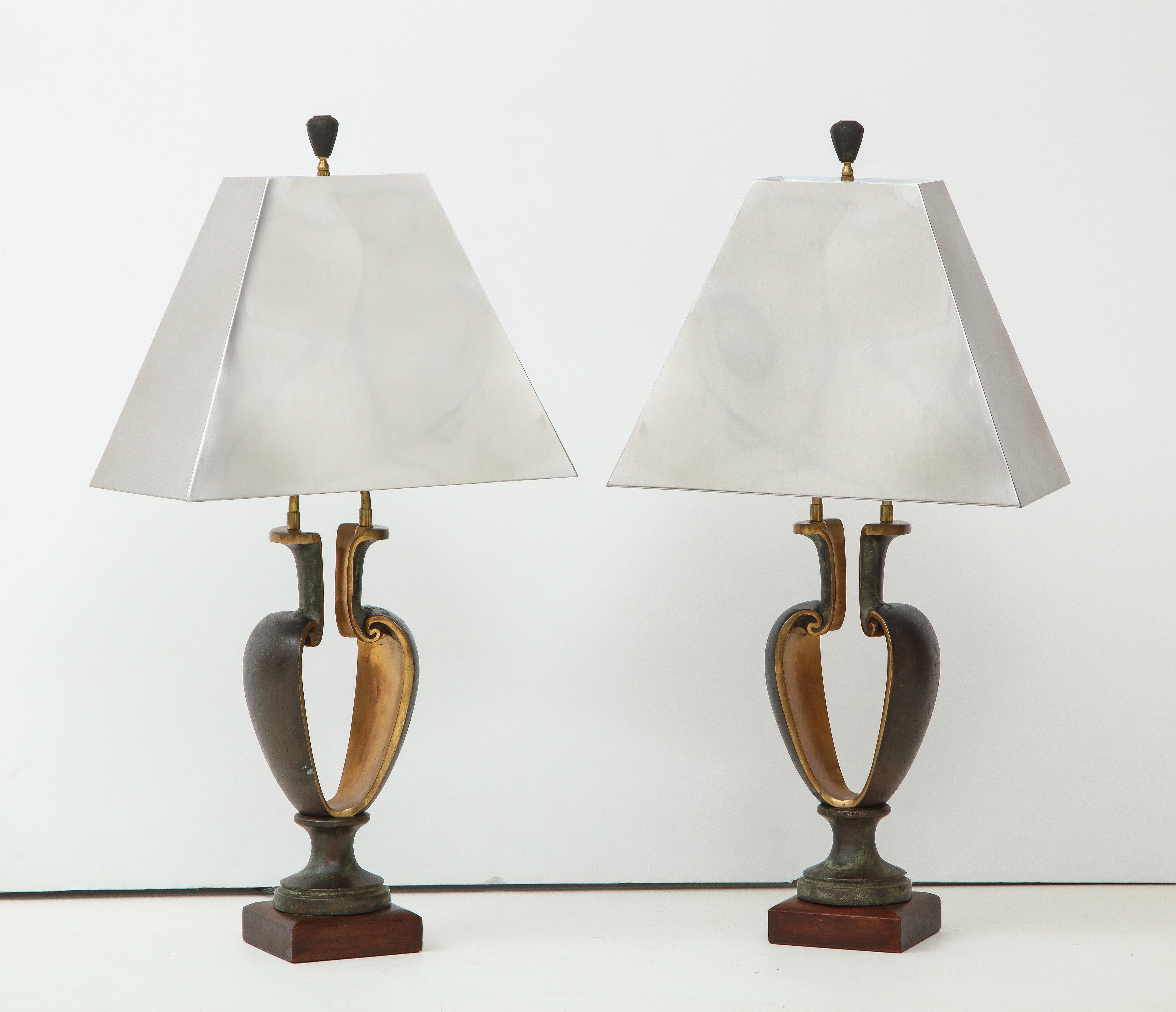 Stunning pair of 1980s solid bronze Brutalist style table lamps with chrome shades. The lamps are well made and very heavy 