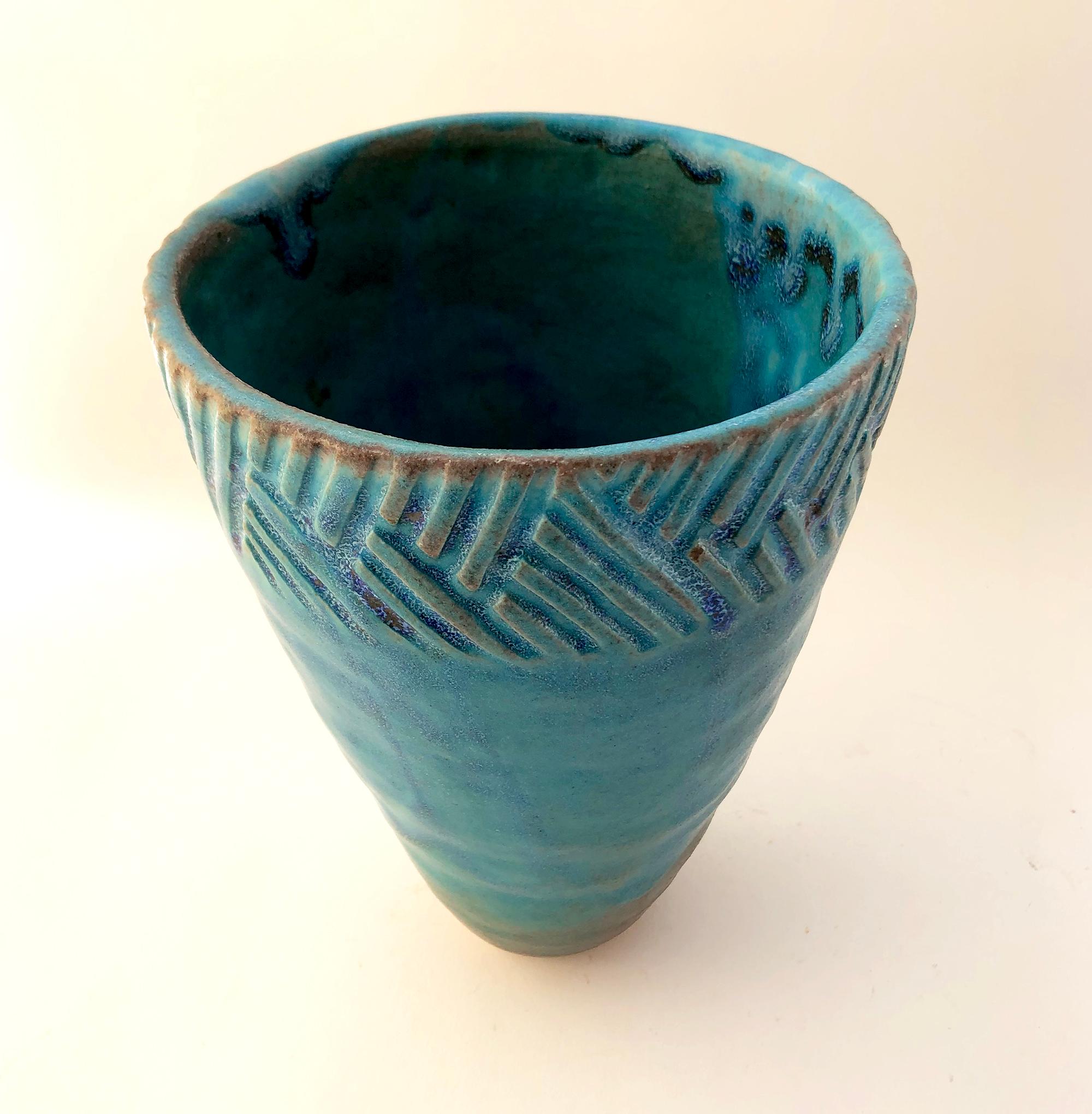 Signed handmade ceramic vase, maker unknown. Measures 9