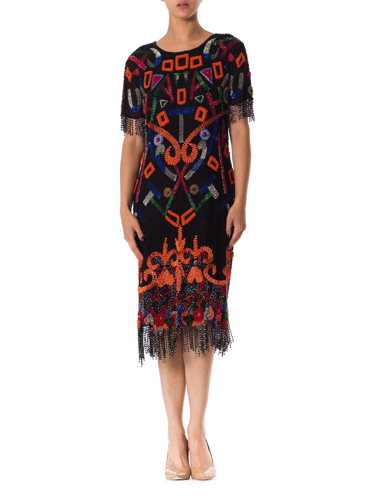 1980S  Black Beaded Silk Chiffon Tribal Inspired Cocktail Dress With Fringe Hem For Sale 2