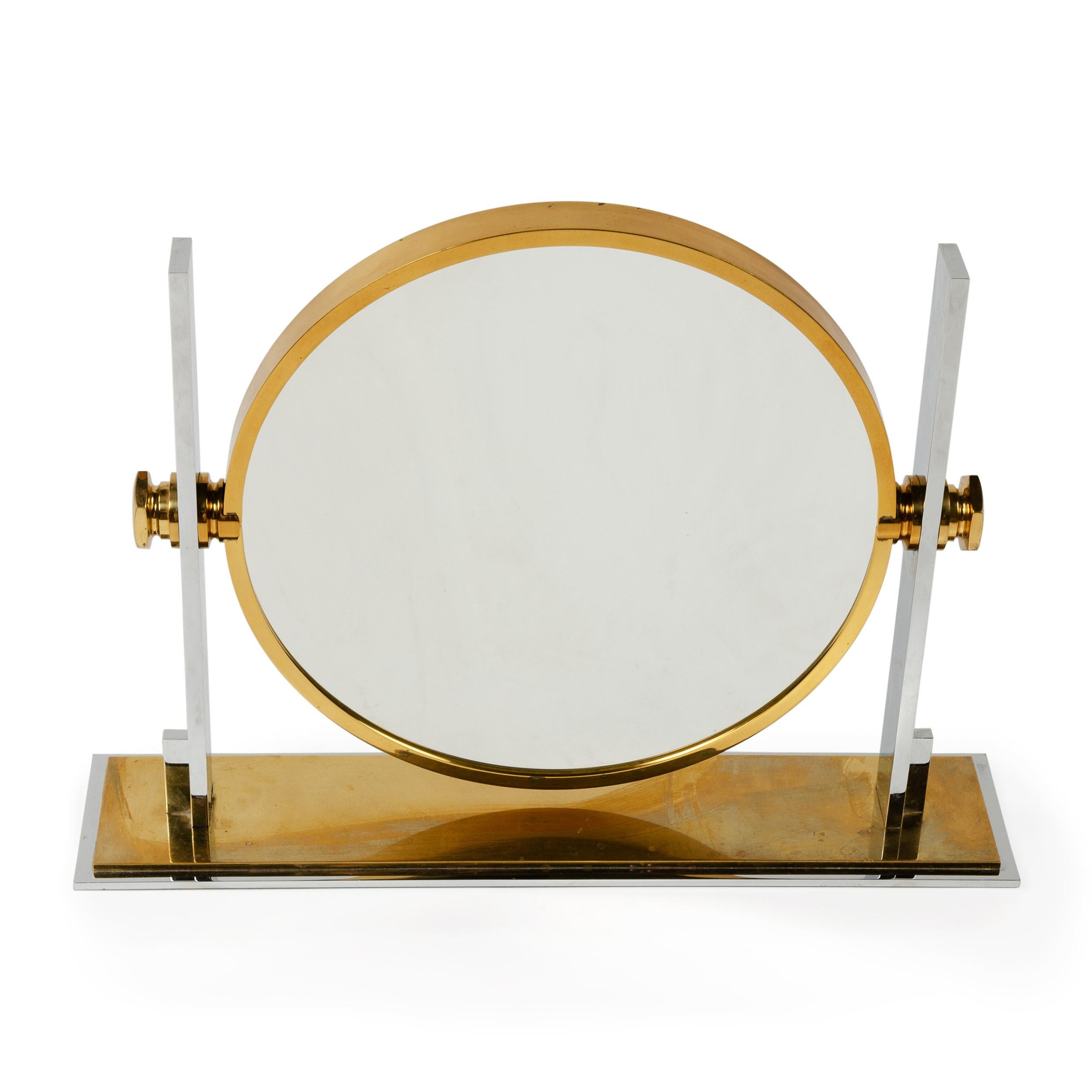 A solid brass and chrome-plated mirror that rotates to feature a 13.5
