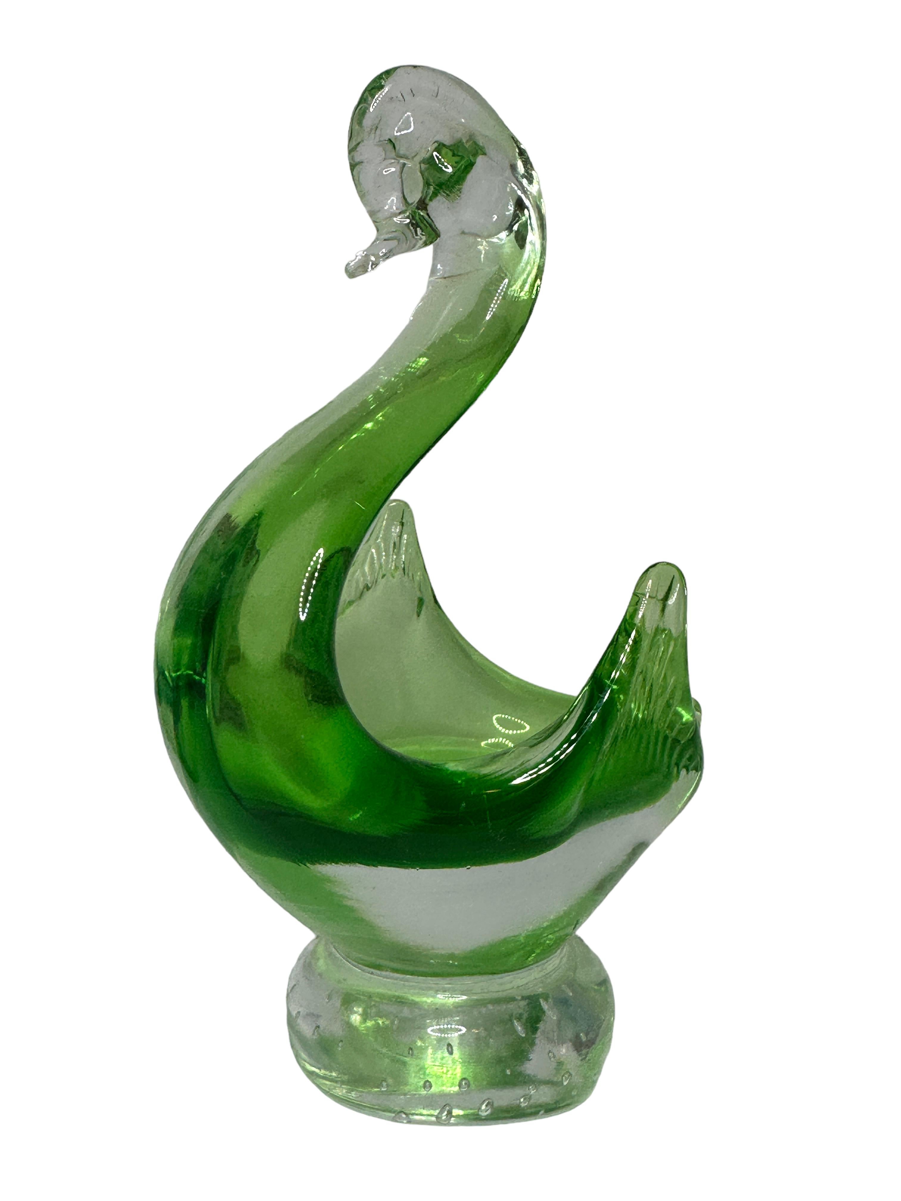 green glass swan