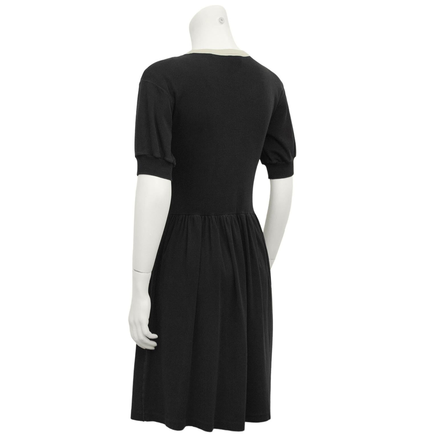 black dress with white trim