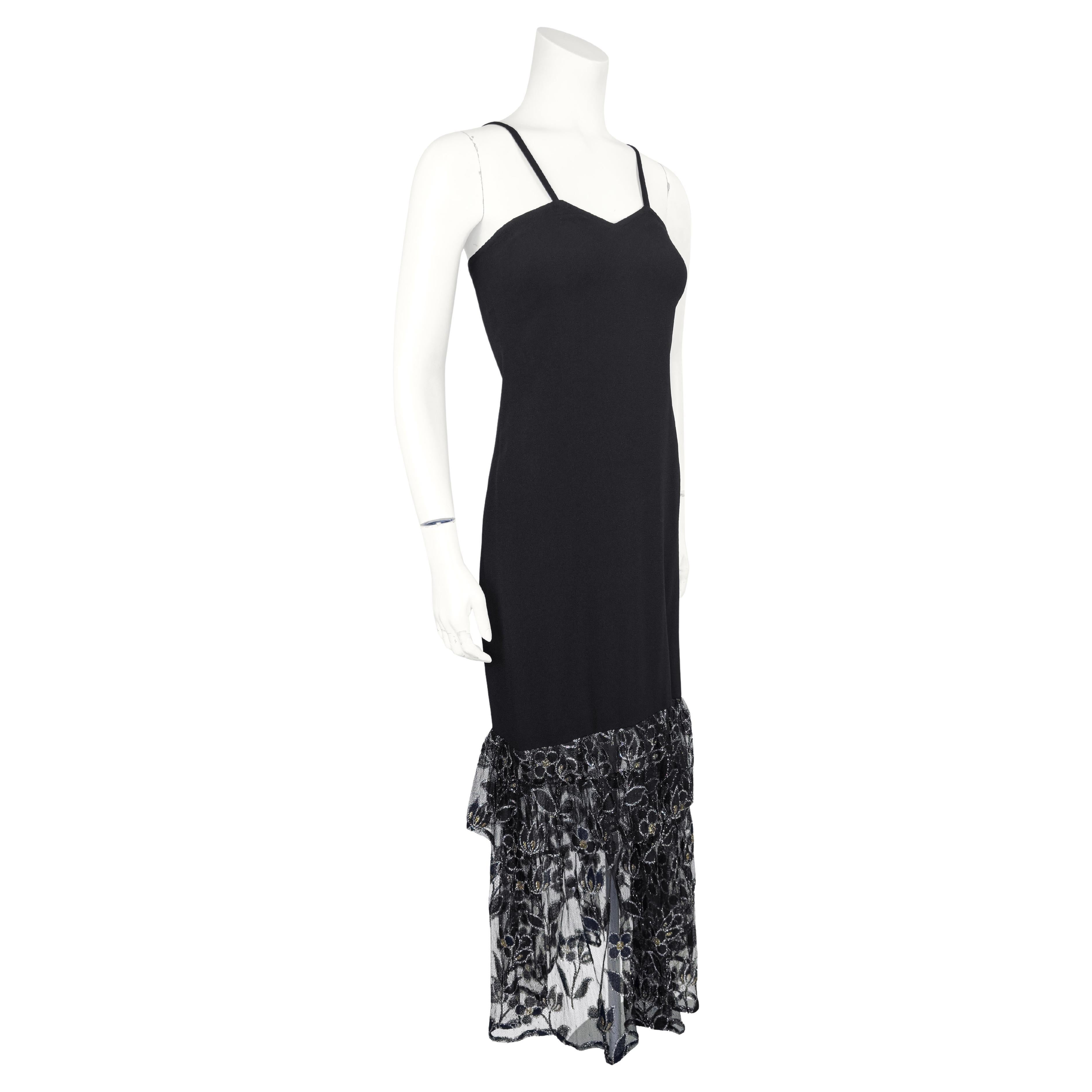 1980s Sonia Rykiel black viscose blend long dress with lace flounce hem. The fitted body of the dress has a sweetheart neckline and the angle of the shoulder straps adds a unique touch. The lace flounce starts at the knee and is double layered; one