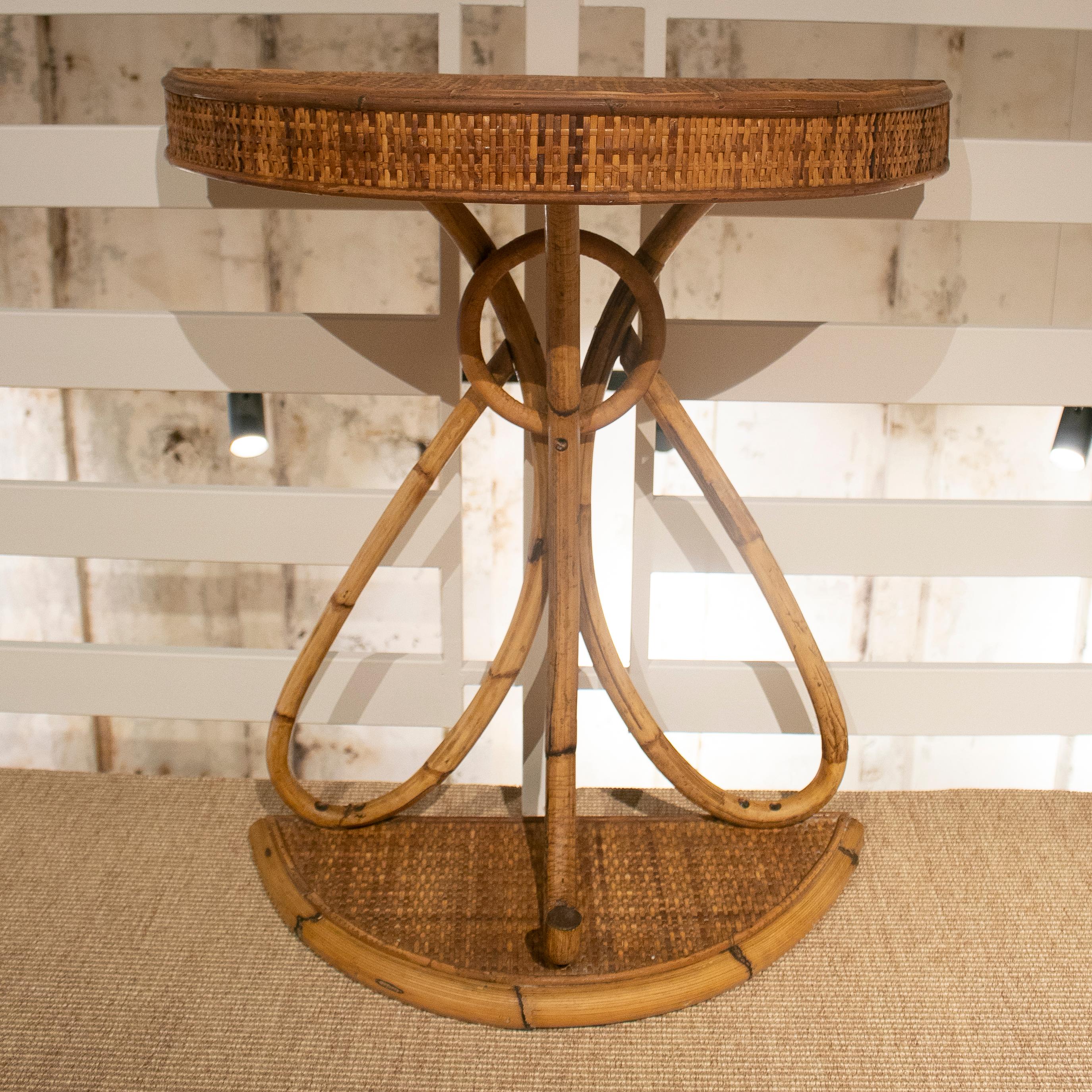 1980s Spanish bamboo and wicker demilune console table.
