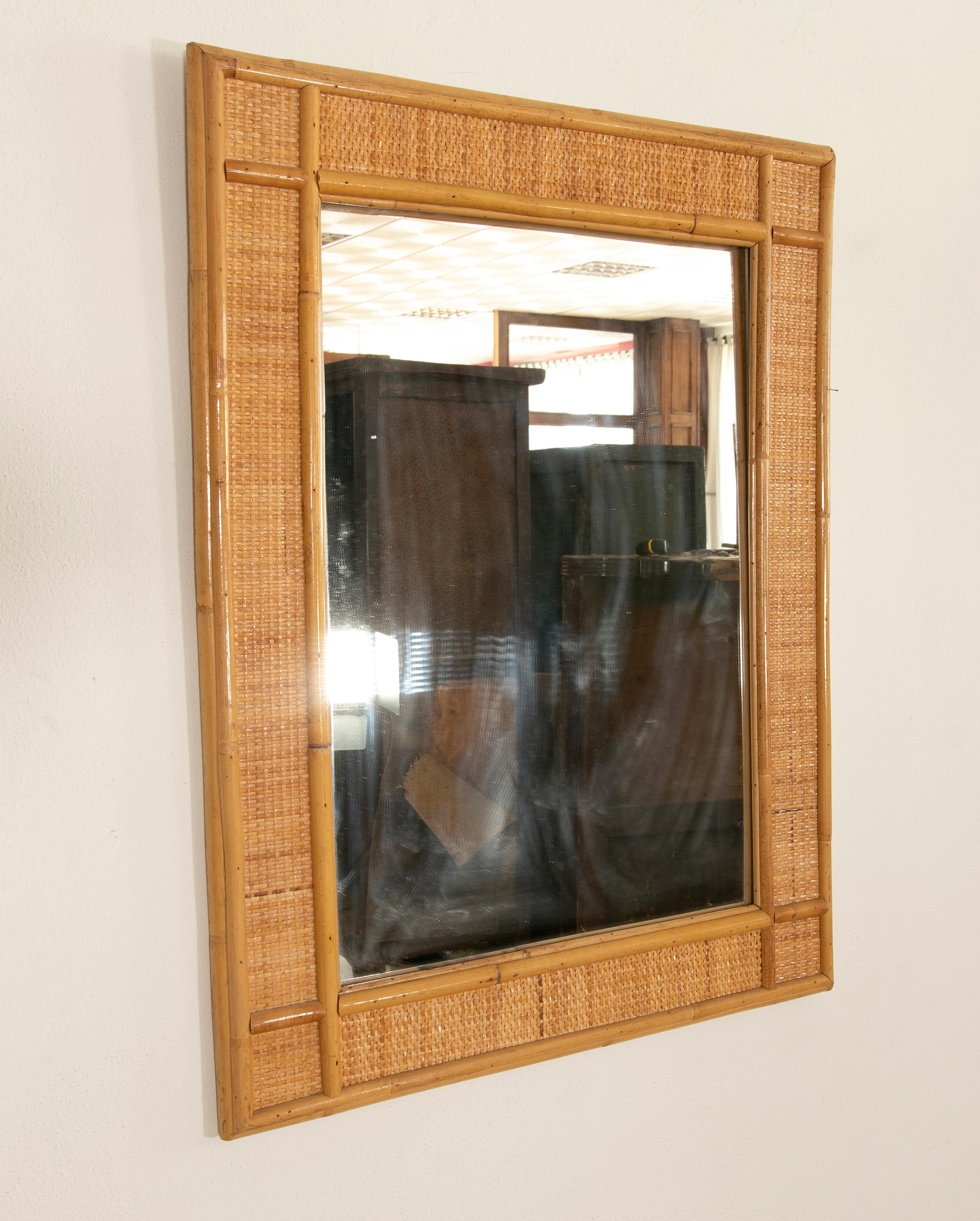 1980s Spanish bamboo and wicker wall mirror.