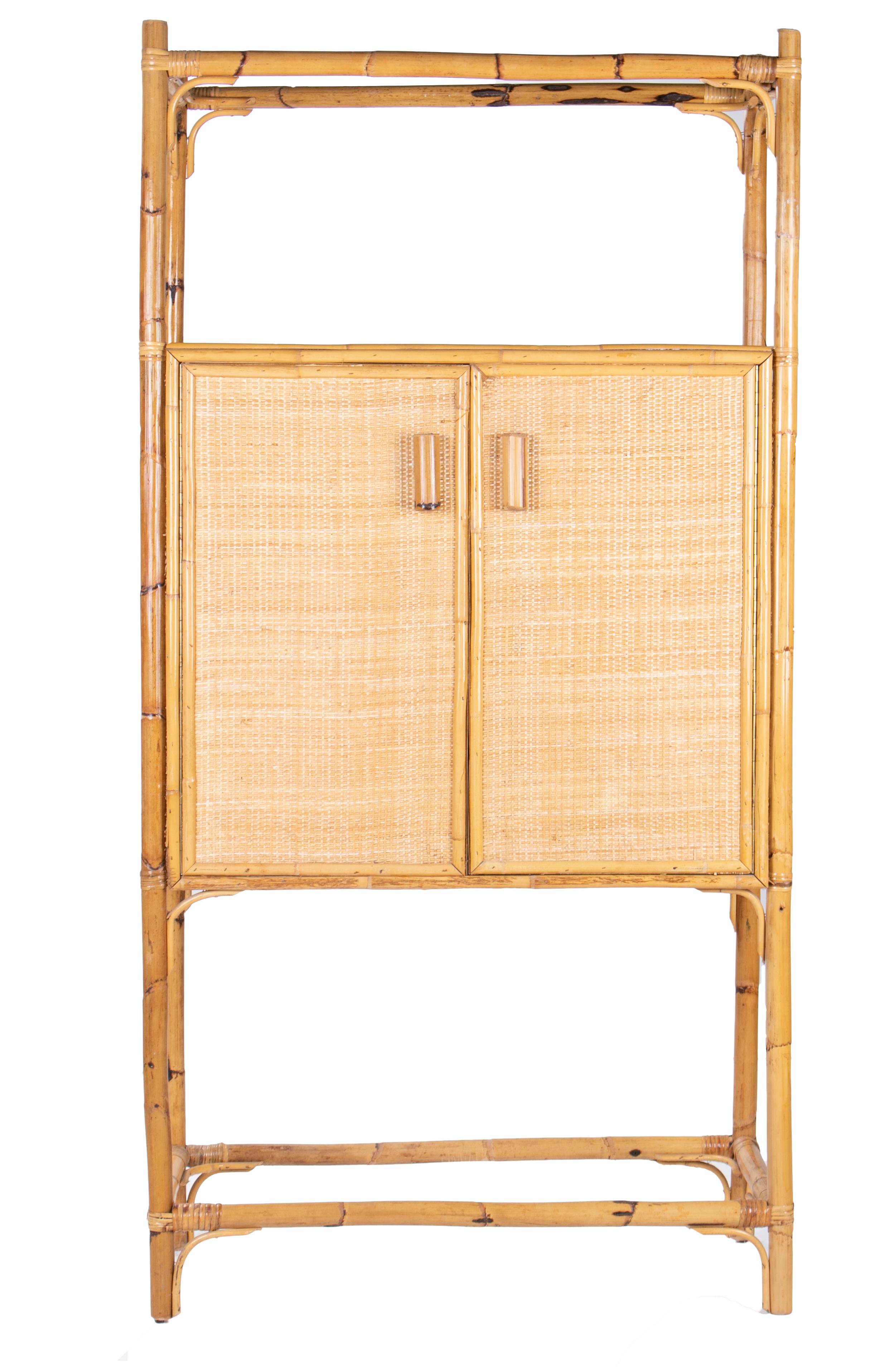 1980s Spanish bamboo two-door shelved bookcase.